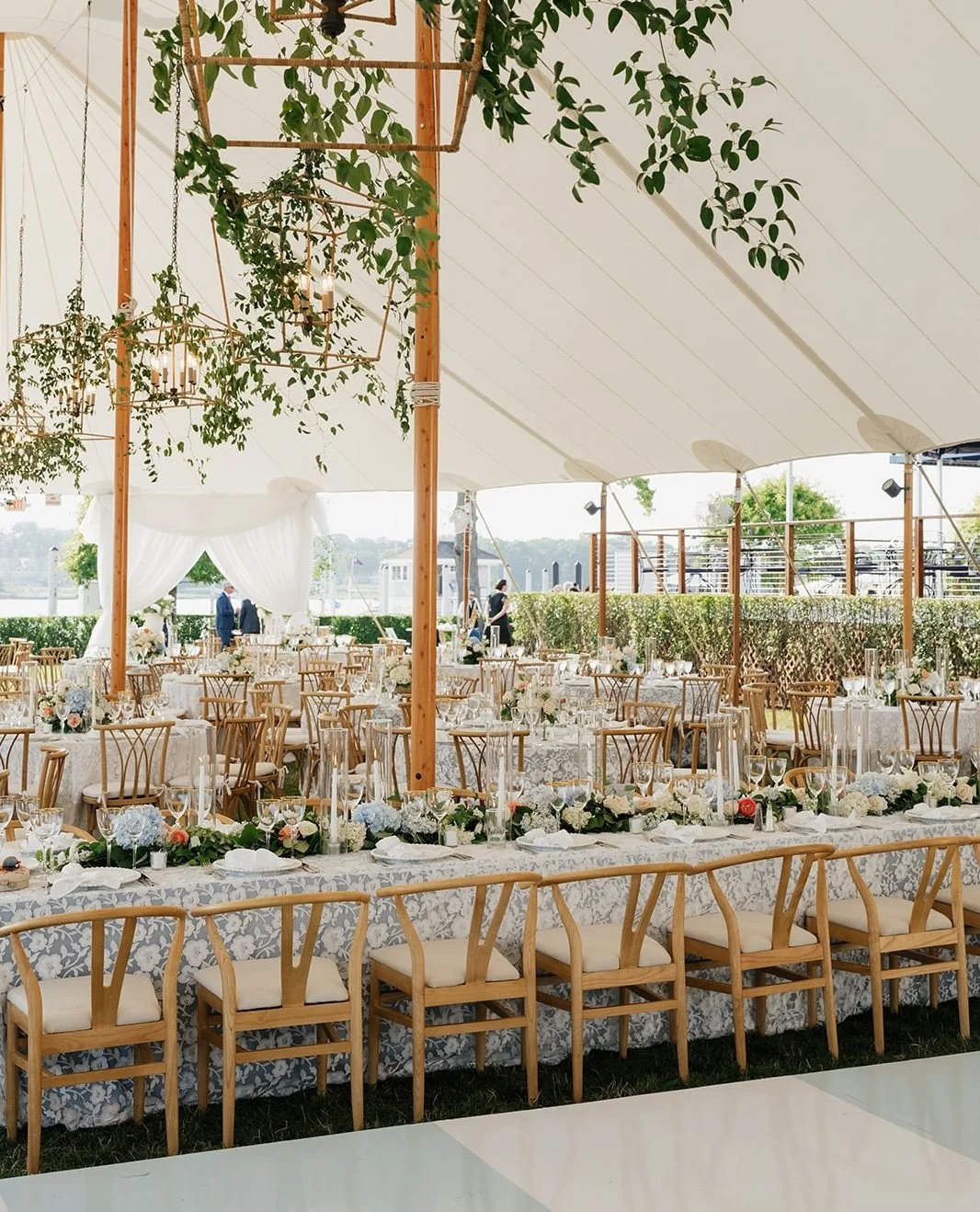 Twenty-four hours before this photo was taken, this was an empty tent.⁠
No greenery cascading from the ceiling. No tables set with flickering candles. No hint of the romantic garden atmosphere that would make guests gasp when they walked in.⁠
⁠
Just 