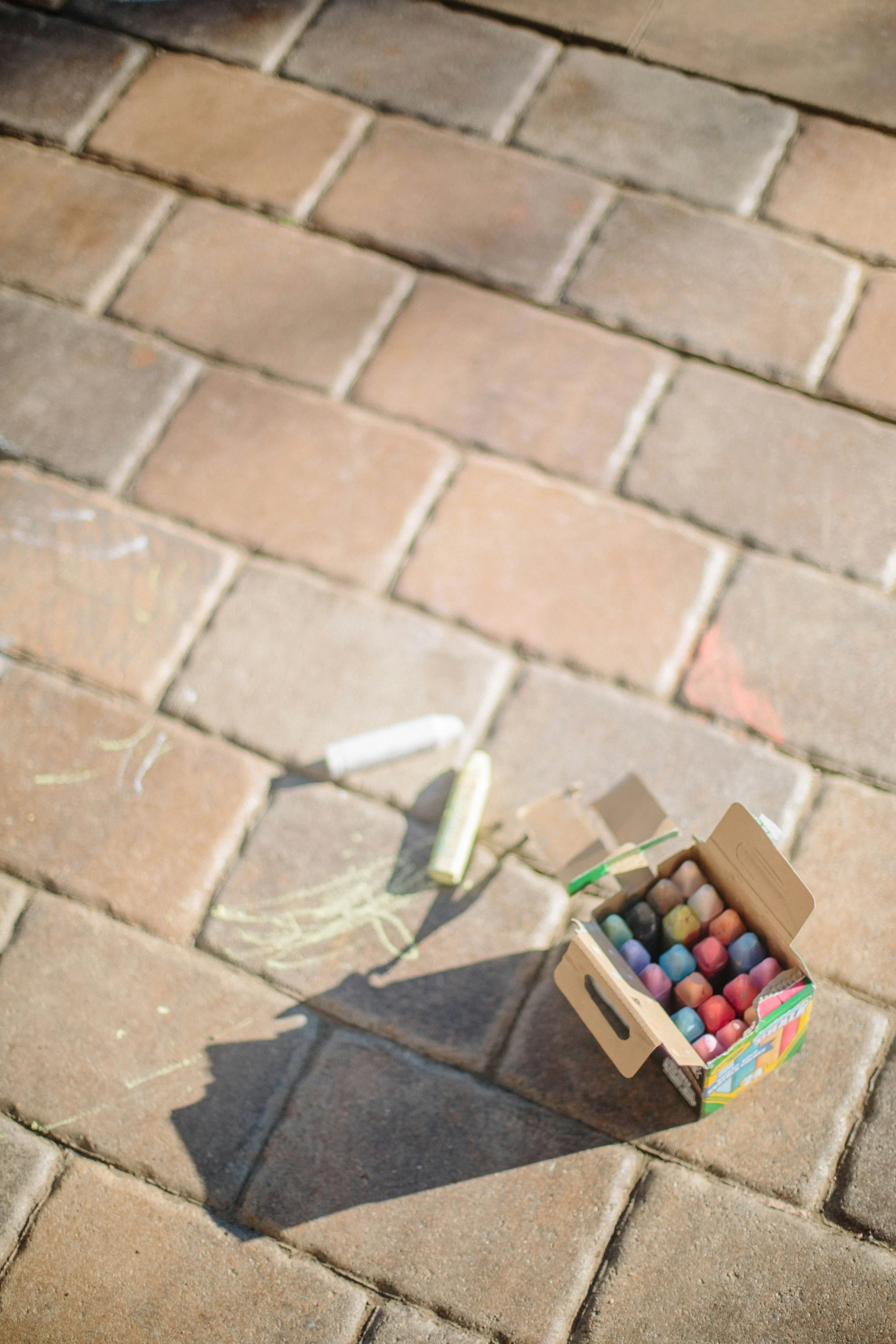 A box of chalk on brick