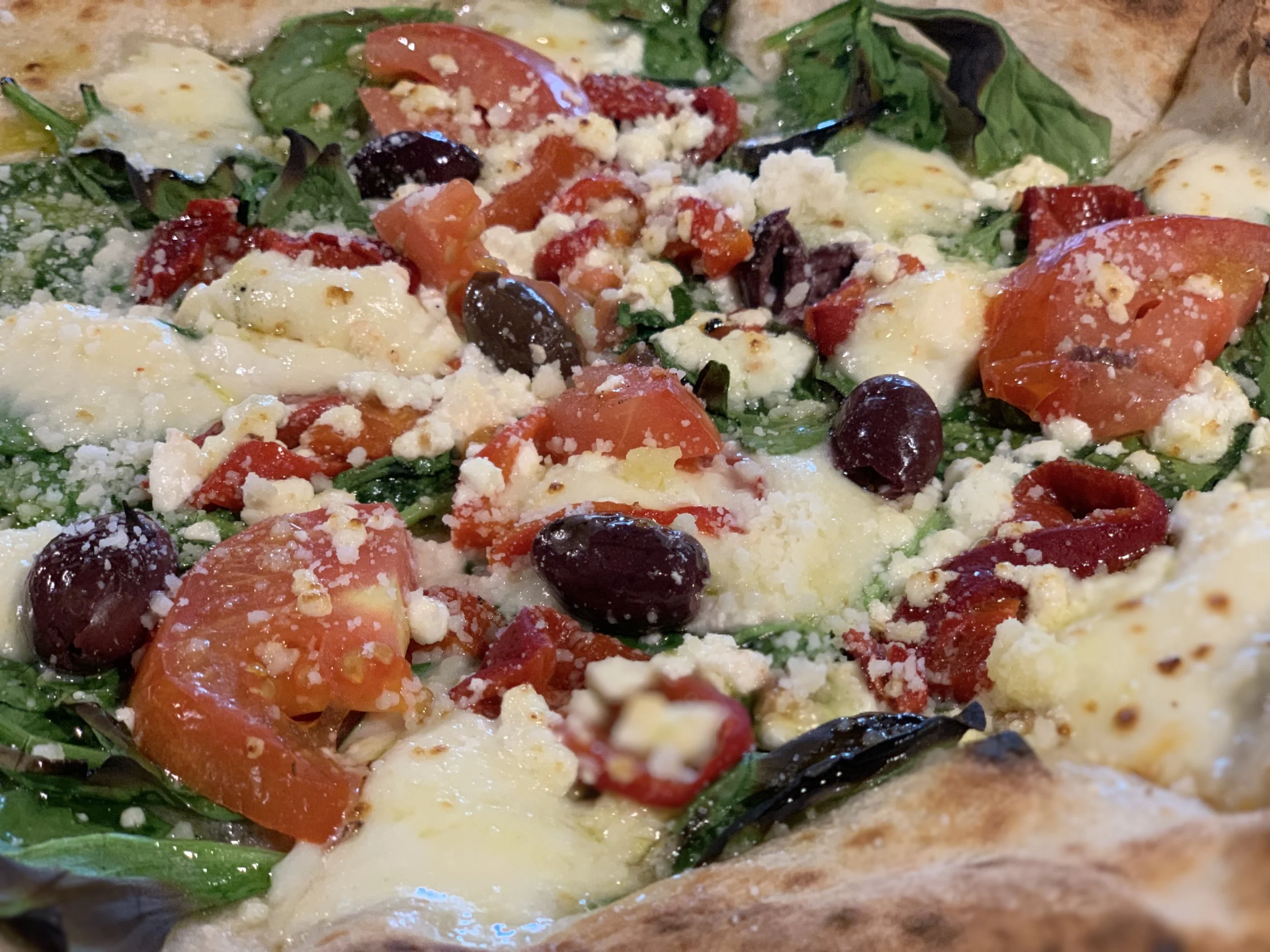 A close up of our group of 7 pizza 