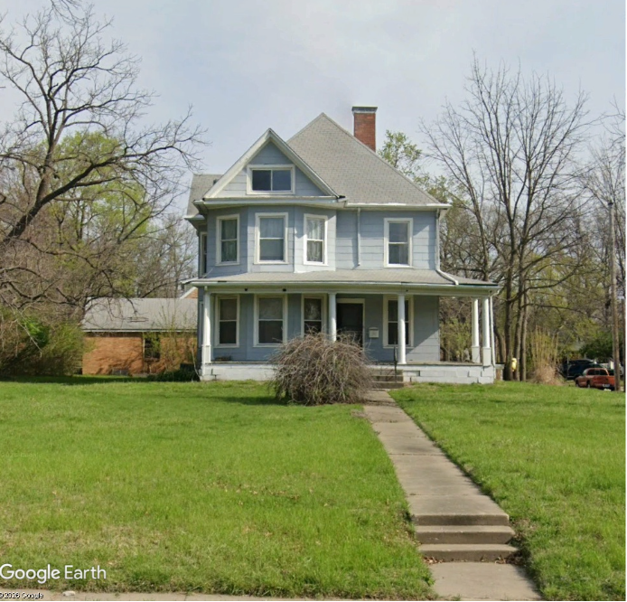 703 West Broadway:                                125 Years of History at a Crossroads