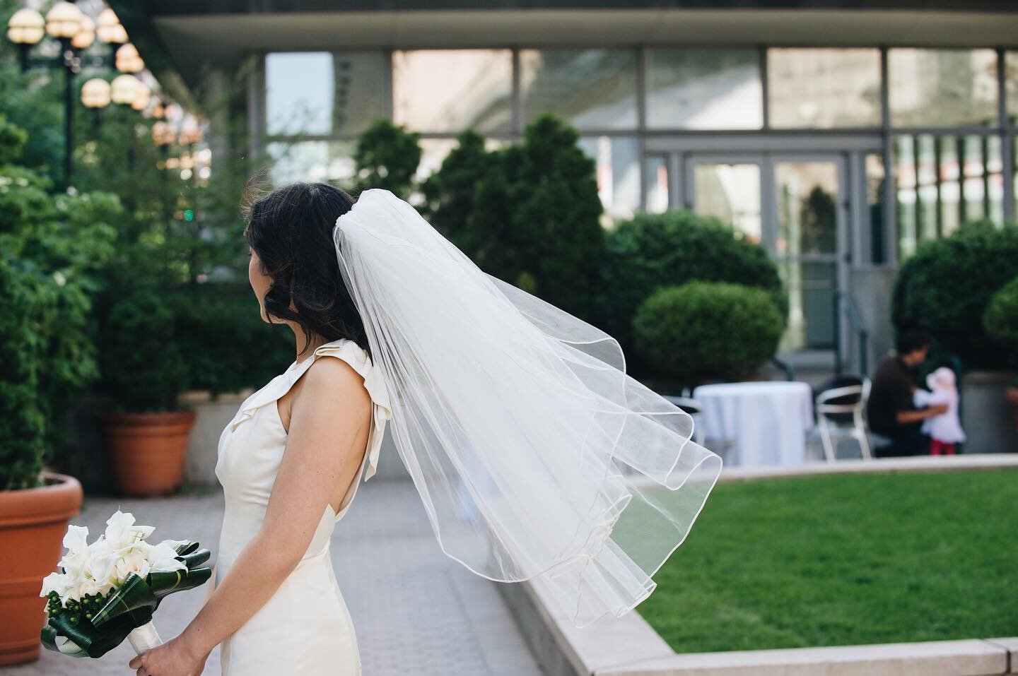 A whimsical moment at Susan and Rich&rsquo;s NYC wedding. #nycwedding #windintheveil #catchingamoment