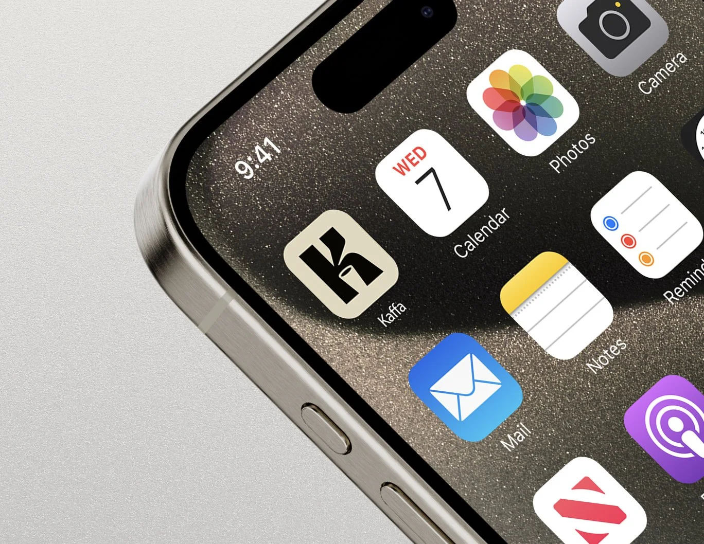 Close-up view of an iPhone screen showing app icons, including Mail, Calendar with date Wednesday the 7th, Photos, and Notes on a glittery background.