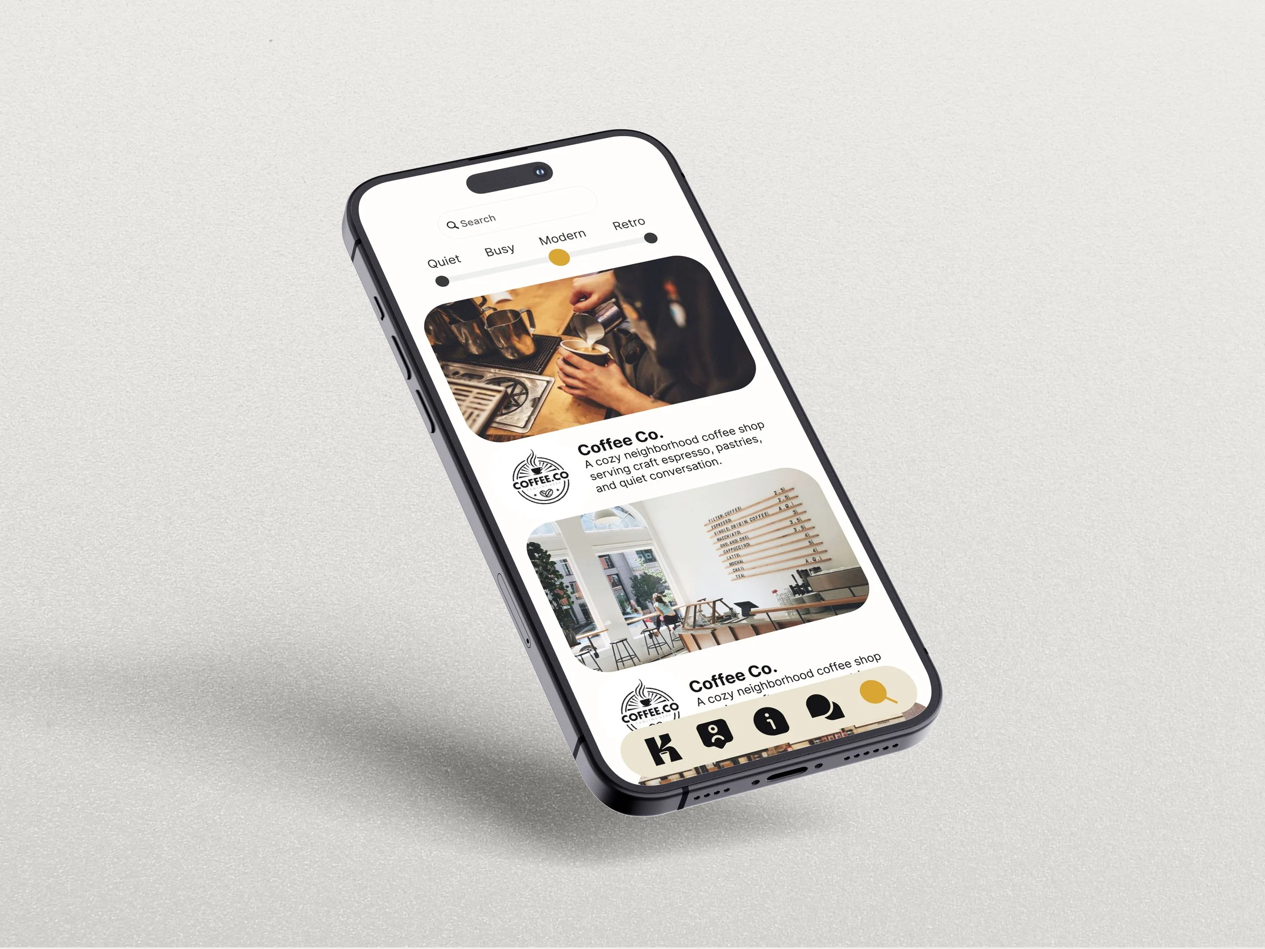 A smartphone lying on a light-colored surface displaying a coffee shop app with images of cozy interior and coffee offerings.