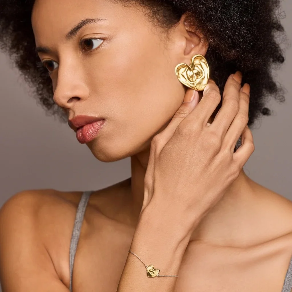 good listener earrings gold1.jpeg