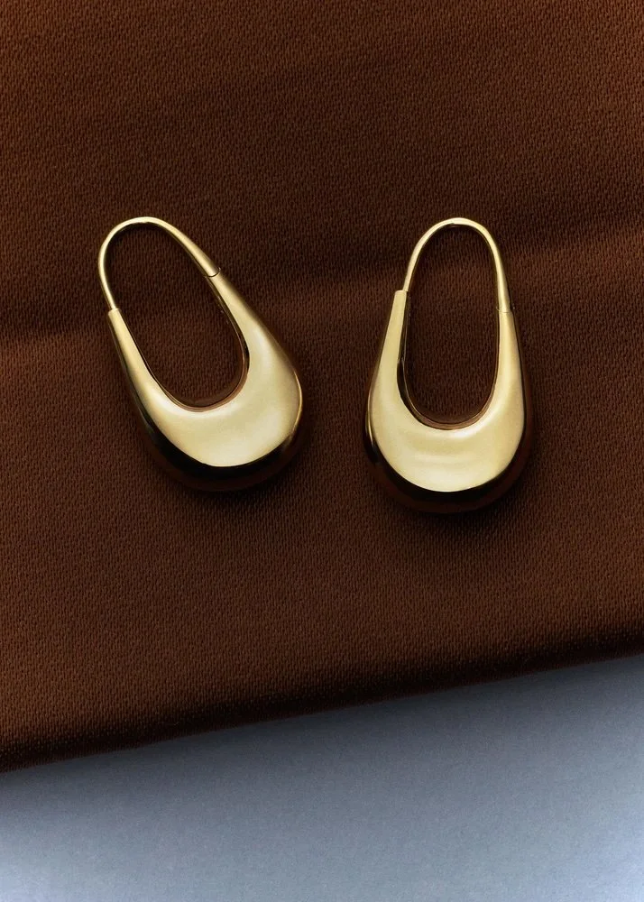 Lightweight gold vermeil hoop earrings by Otiumberg.jpeg