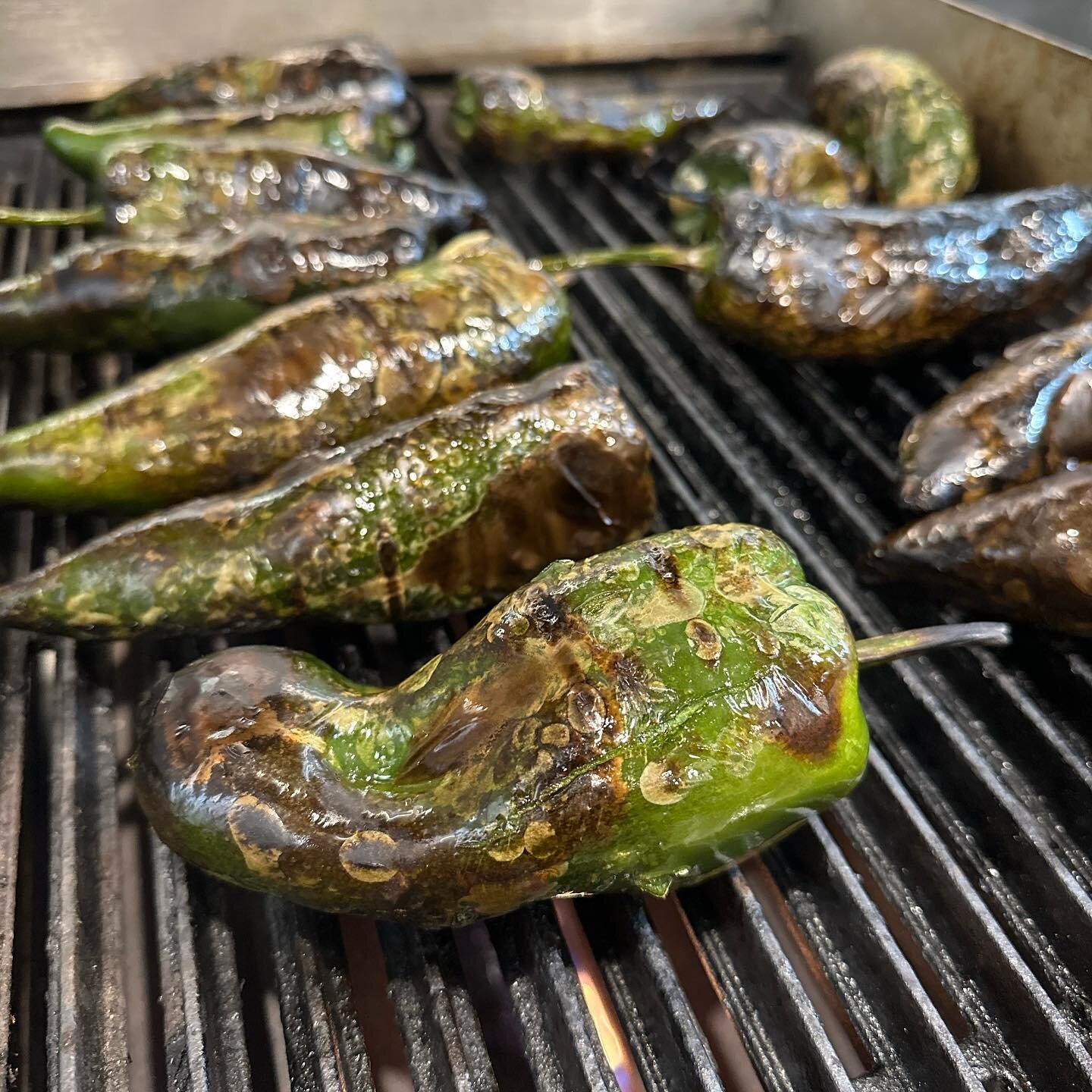 The crackle of a poblano and live fire is music to the ears.