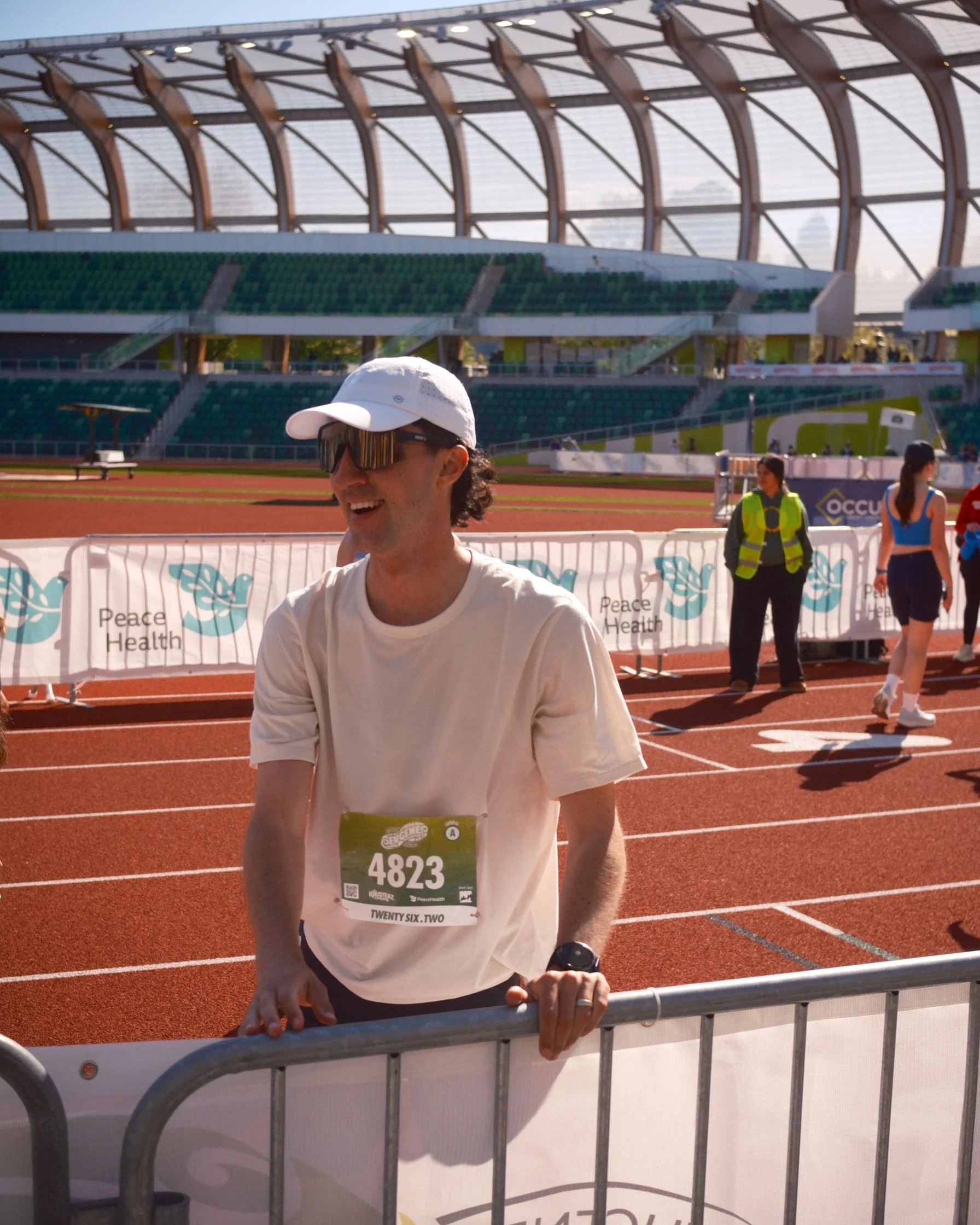 At the finish line of the 2026 Eugene Marathon. New PR of 2:44:37!