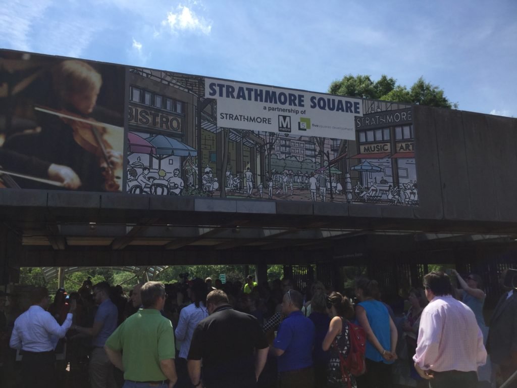 A sign at the Grosvenor-Strathmore Metro Station describes how long the shops will be open.