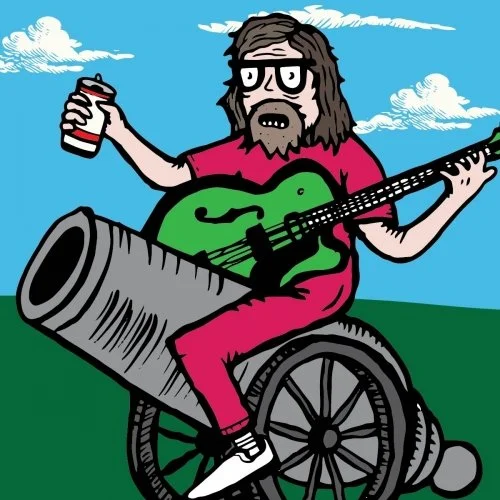 MAN ON CANNON PLAYING GUITAR