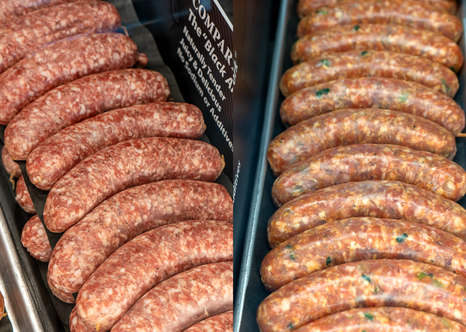 Hand made sausages in a meat department case.