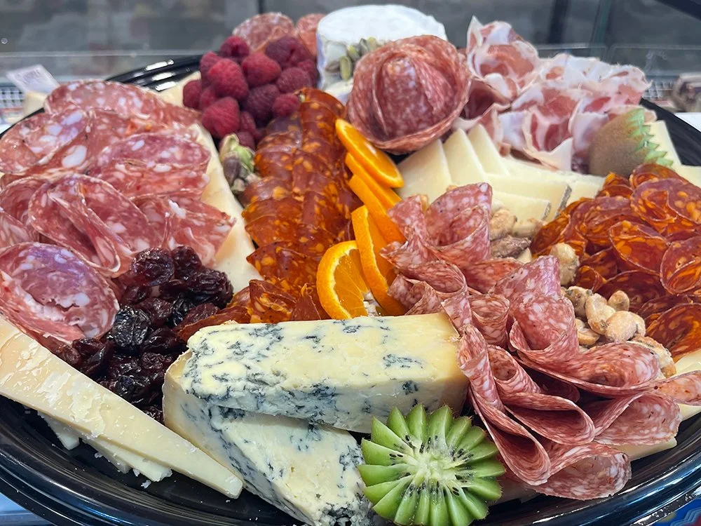 Custom made charcuterie board with artisanal cheese.