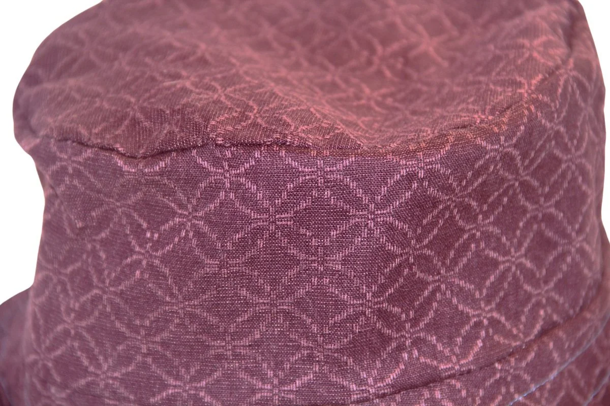 Close up view of pattern on elevated bucket hat made from Japanese Morikiku jacquard cotton fabric. Reverses to a heavyweight vintage denim cotton. Made by hand - Tonya Gross Millinery.