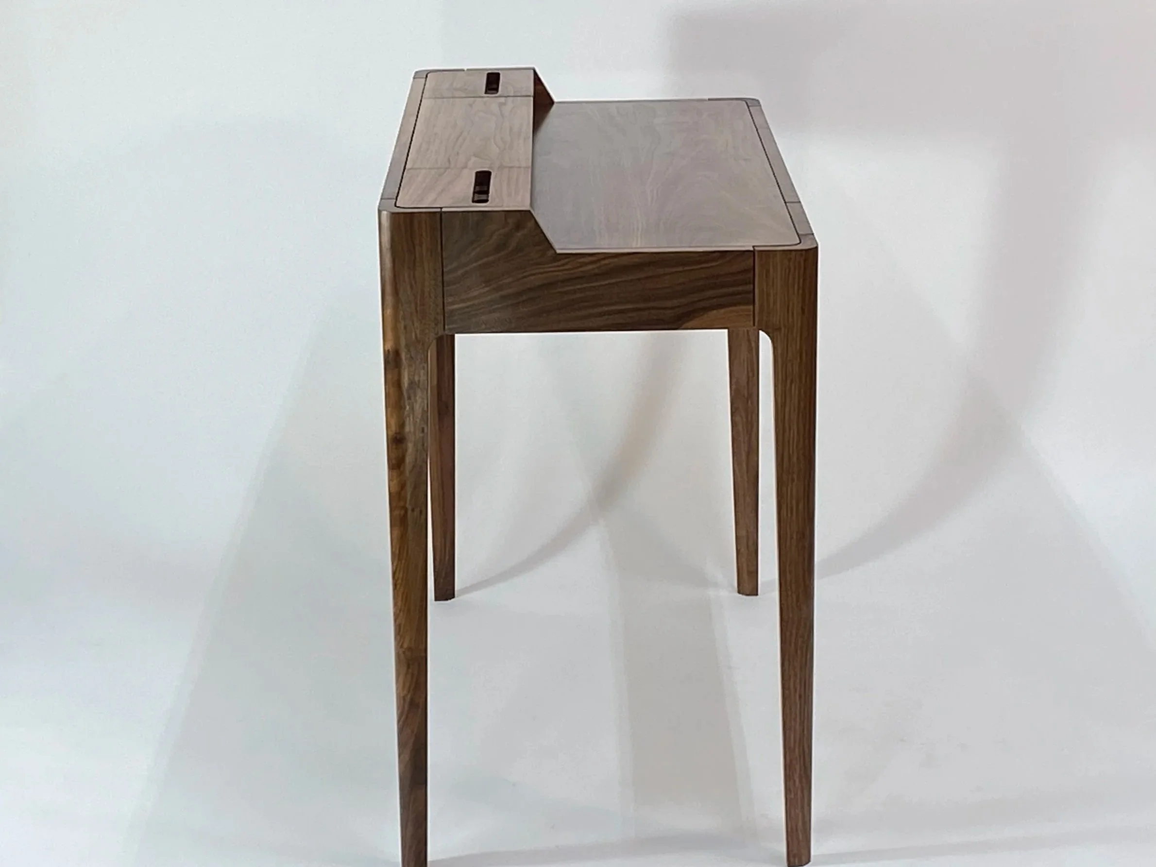 Writing surface is 38-1/2 in. wide x 12-3/4 in. deep