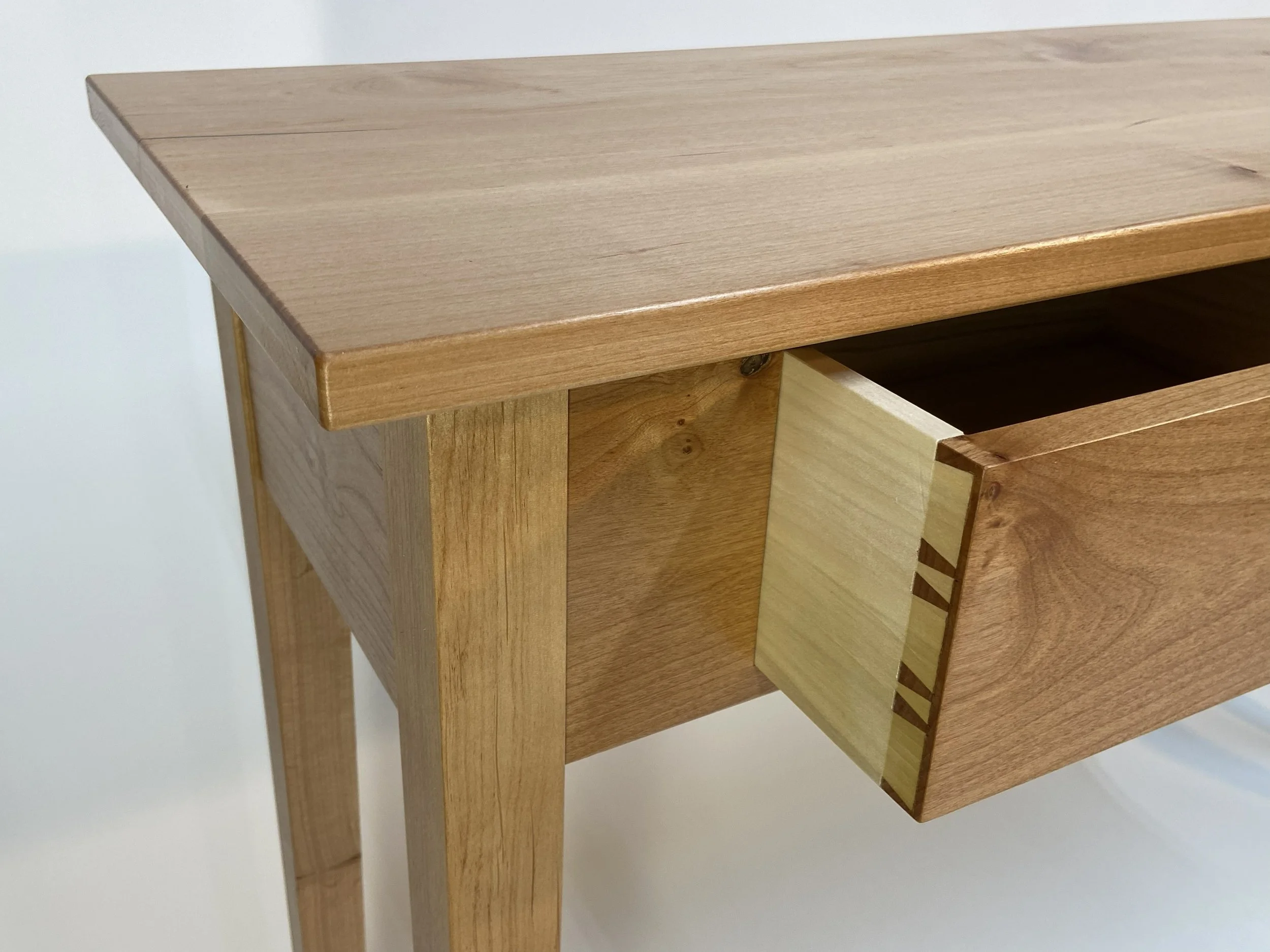 Handcut dovetail drawers are evidence of the craftsmanship