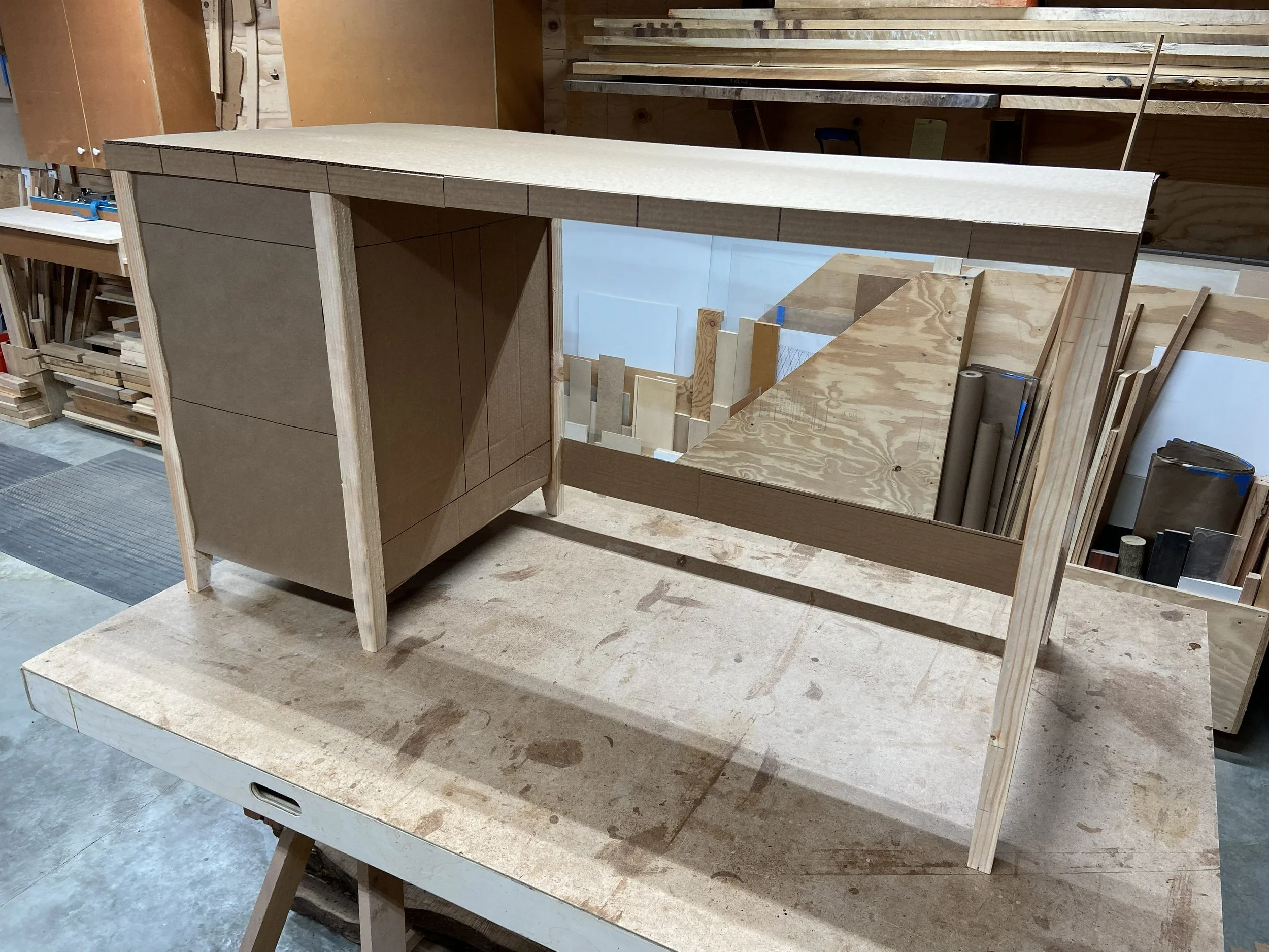 At the beginning of the design process, I discussed details with the client and settled on overall dimensions of 60 inch wide x 26 inch deep x 32-3/4 inch tall. The desk is quite tall to match the client's 6 ft. 4 in. height. That's one of the benefi