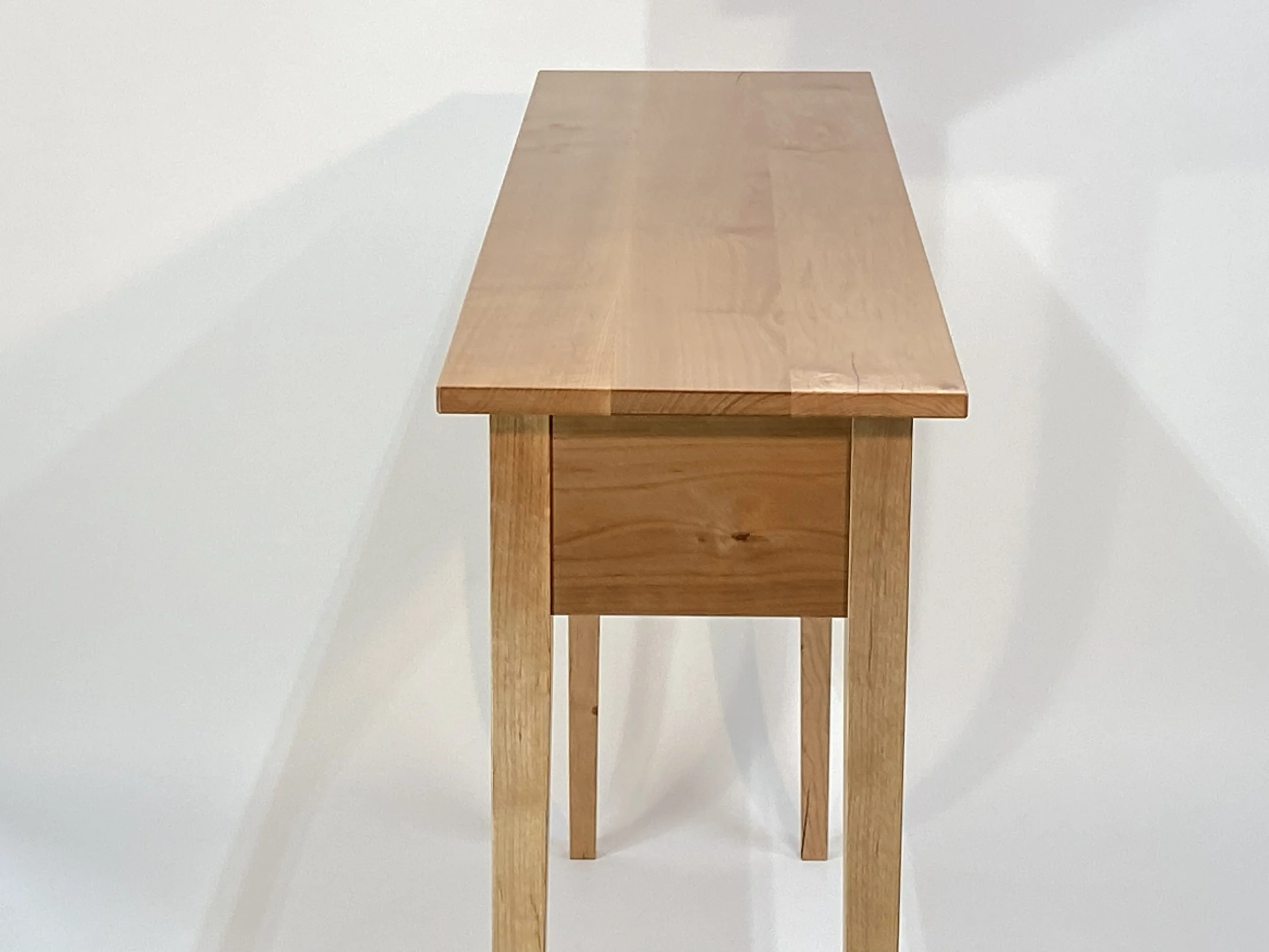 The legs are gently tapered to add lightness to the stance