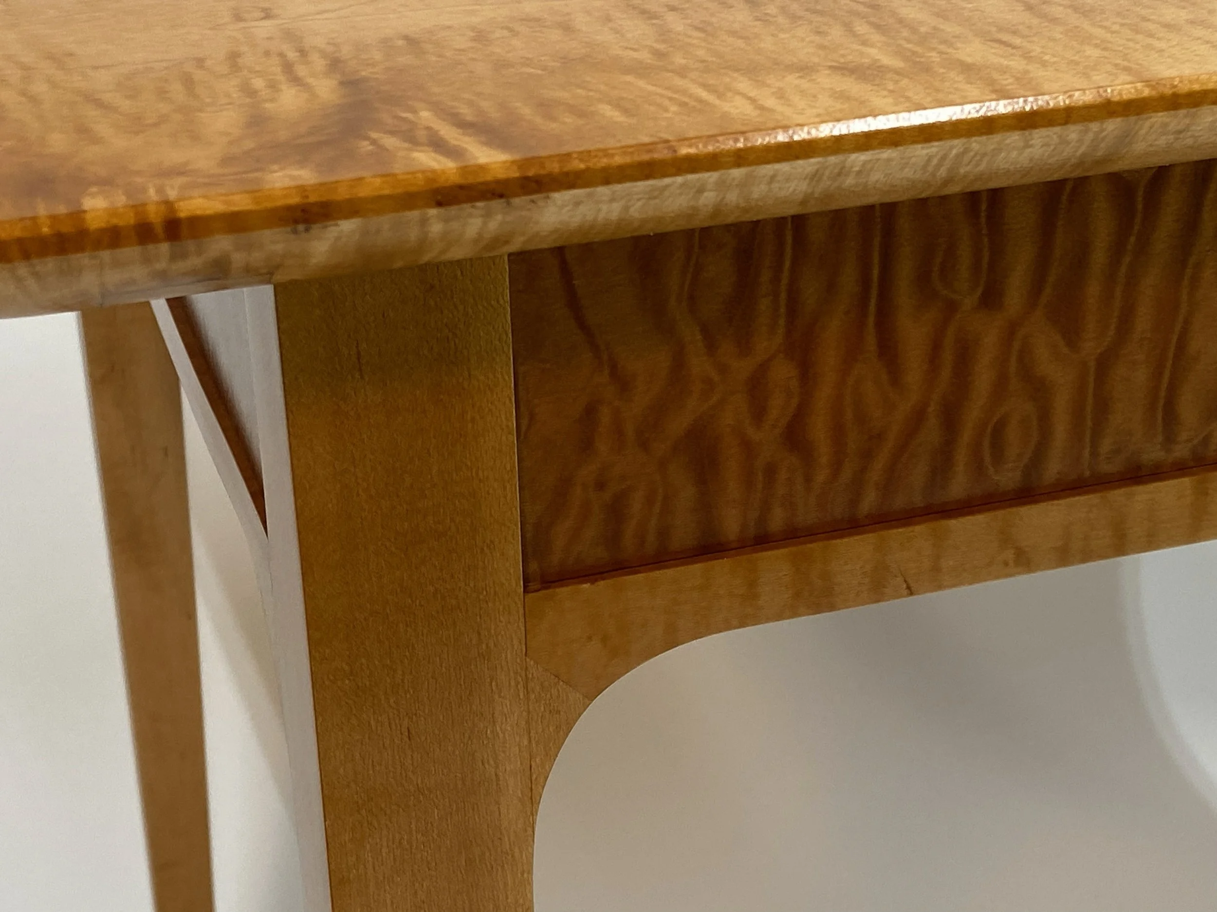 Different from the Dining Table for 2, this table has rounded transitions from the apron to the legs, along with a "gunstock' miter joint for strength