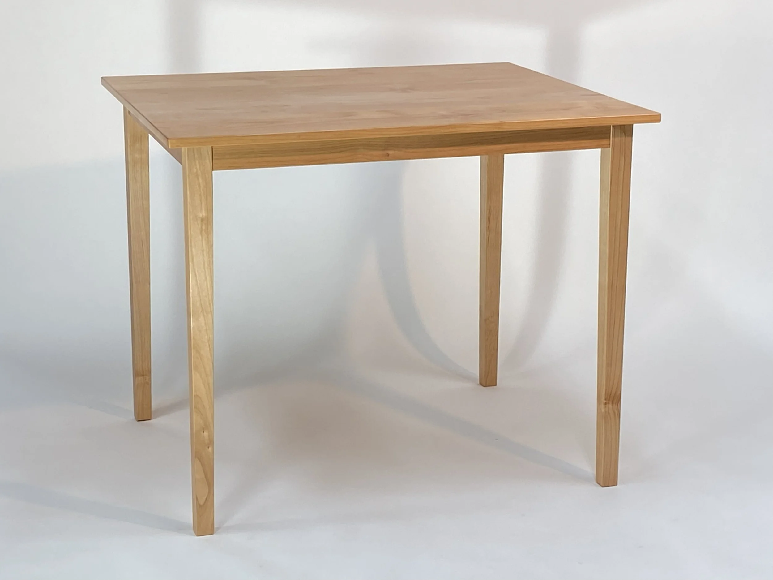 Alder dining table is 36" wide x 30" deep x 29" tall