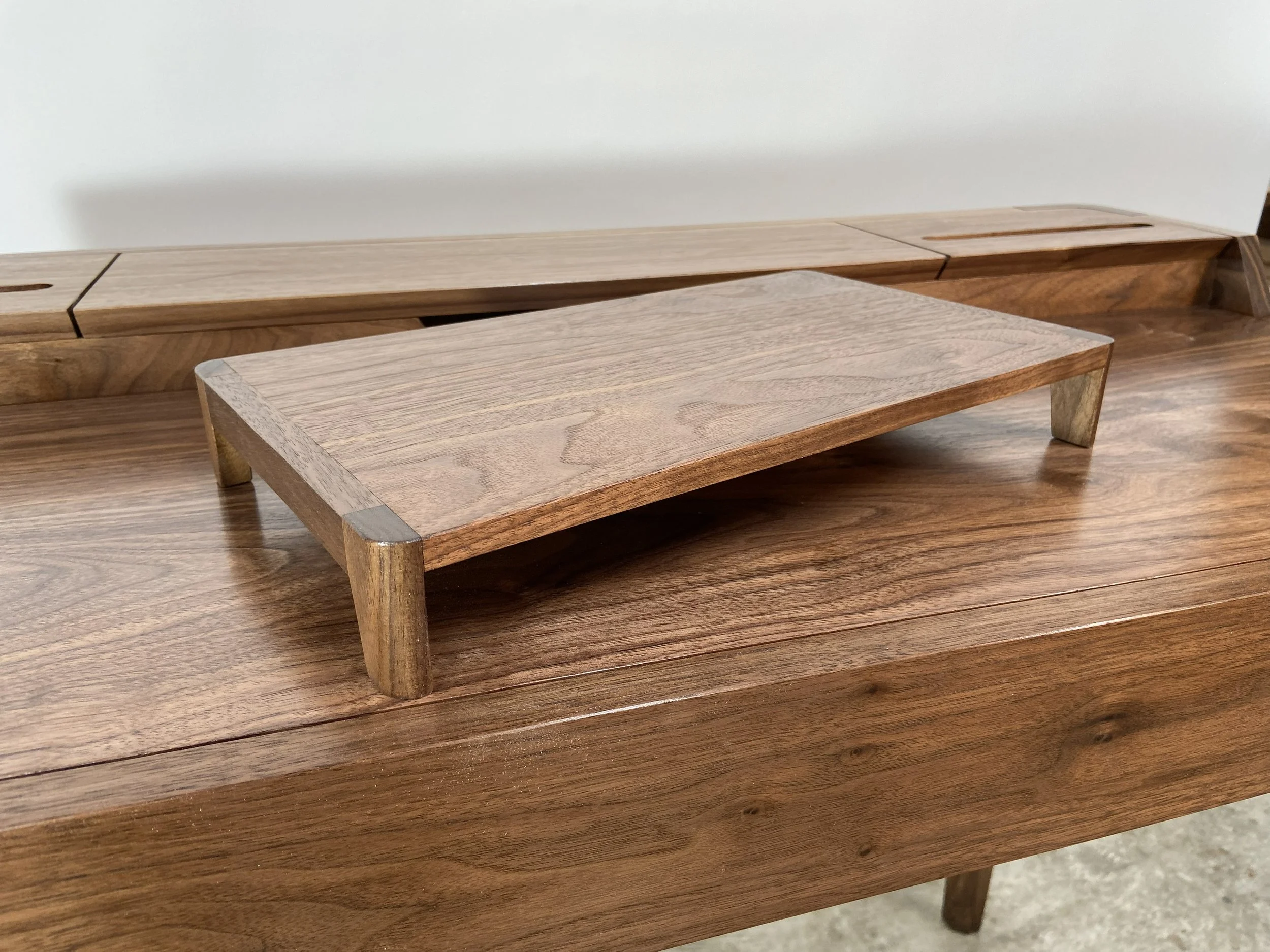 The client wanted a 2 in. high platform for their laptop