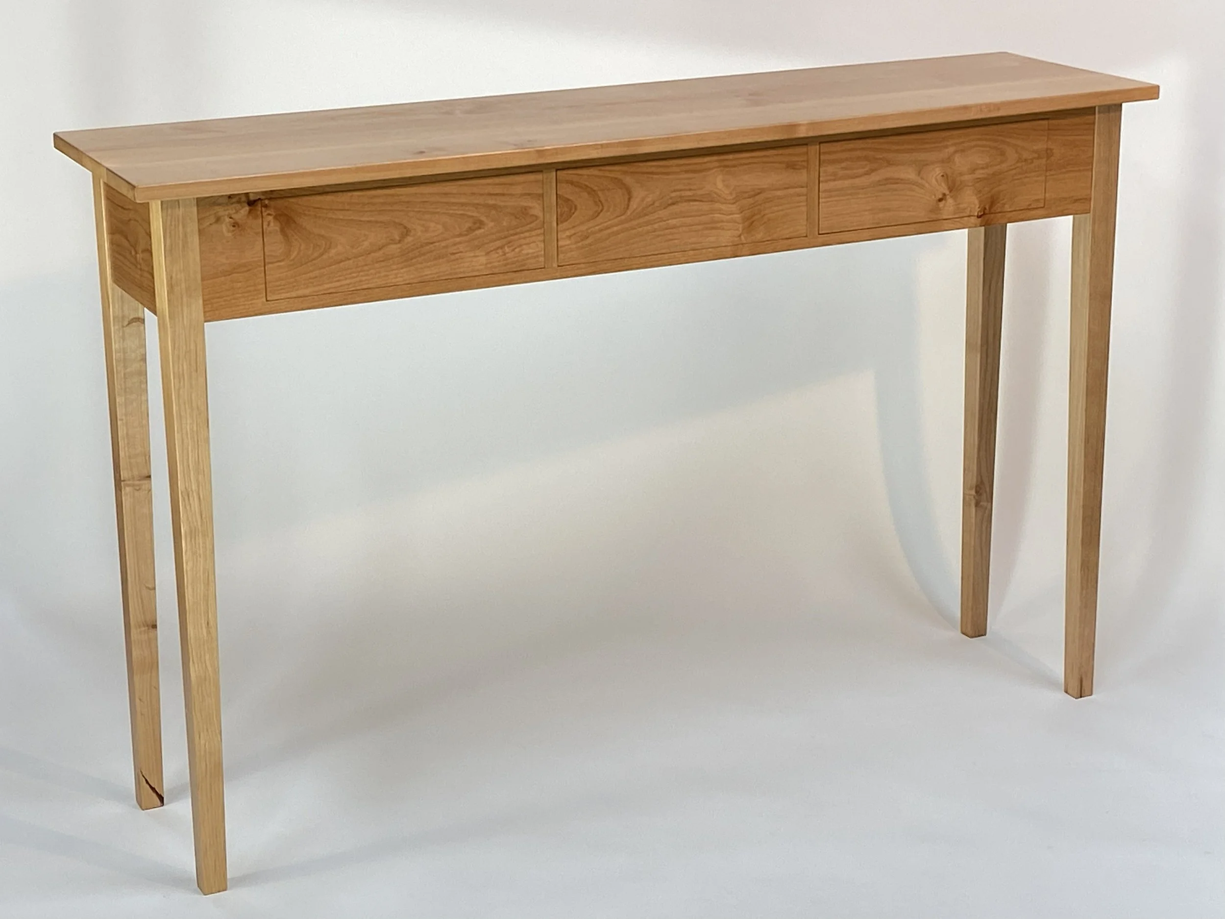The console table is 60" wide, 15-1/2" deep and 38" tall