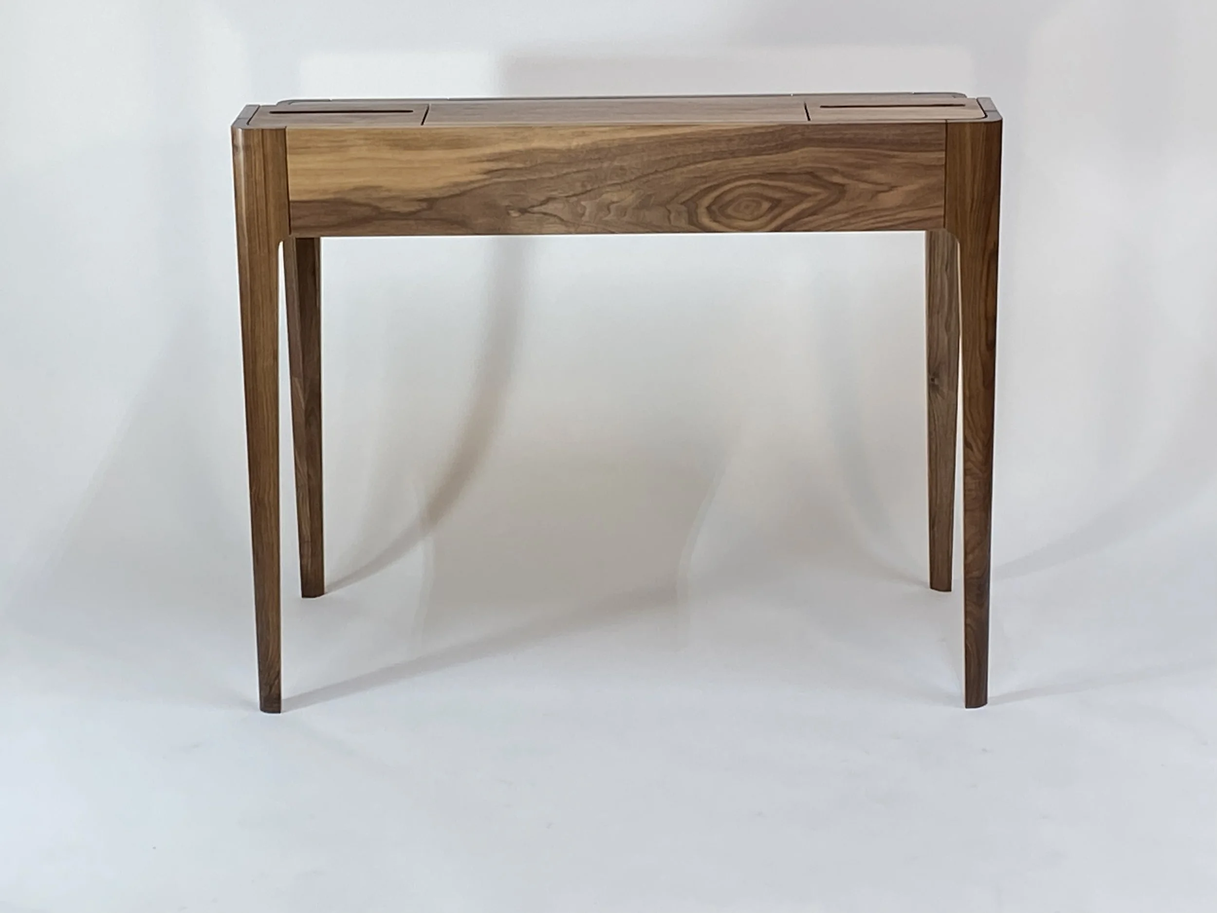 The back shows the varied color of Walnut