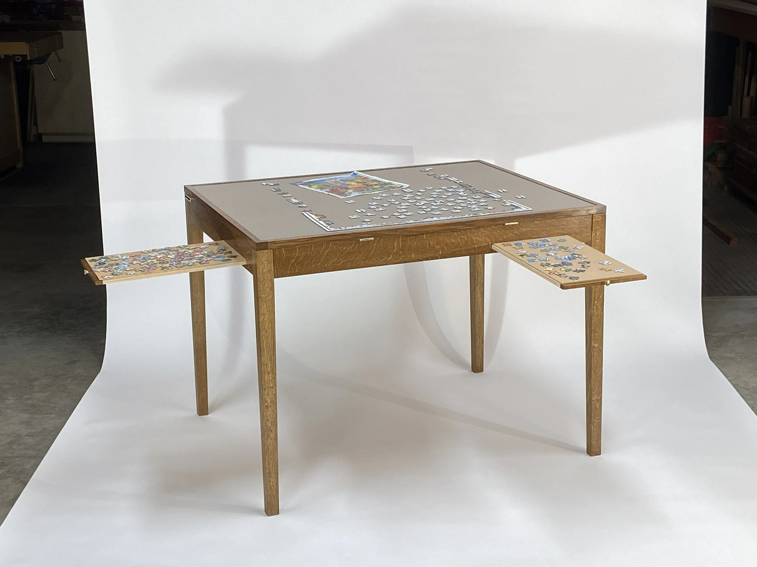 Each side of the table has a pull-out shelf.