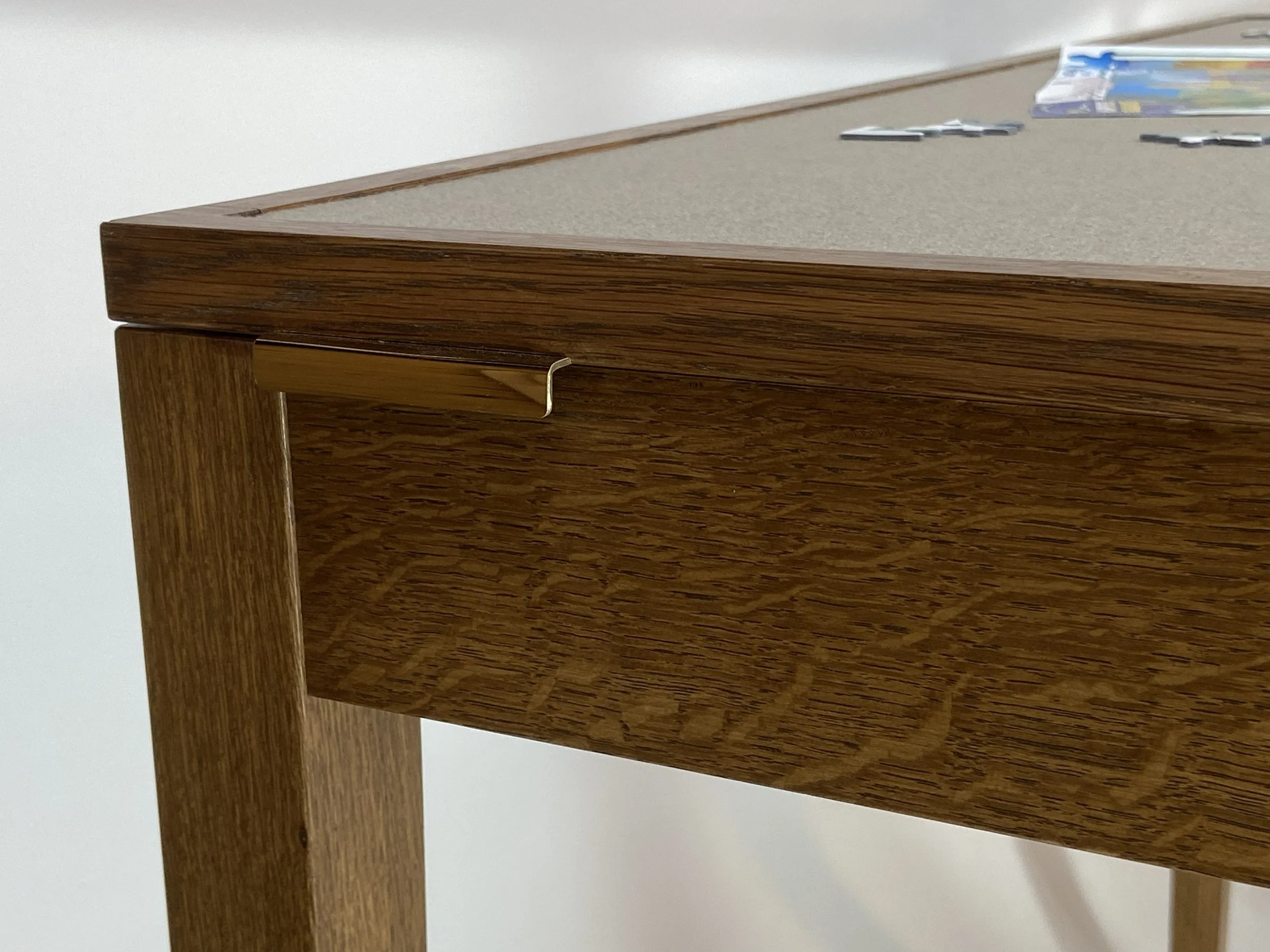 Solid brass handles on both sides of the table assist when lifting & tilting the tabletop. 