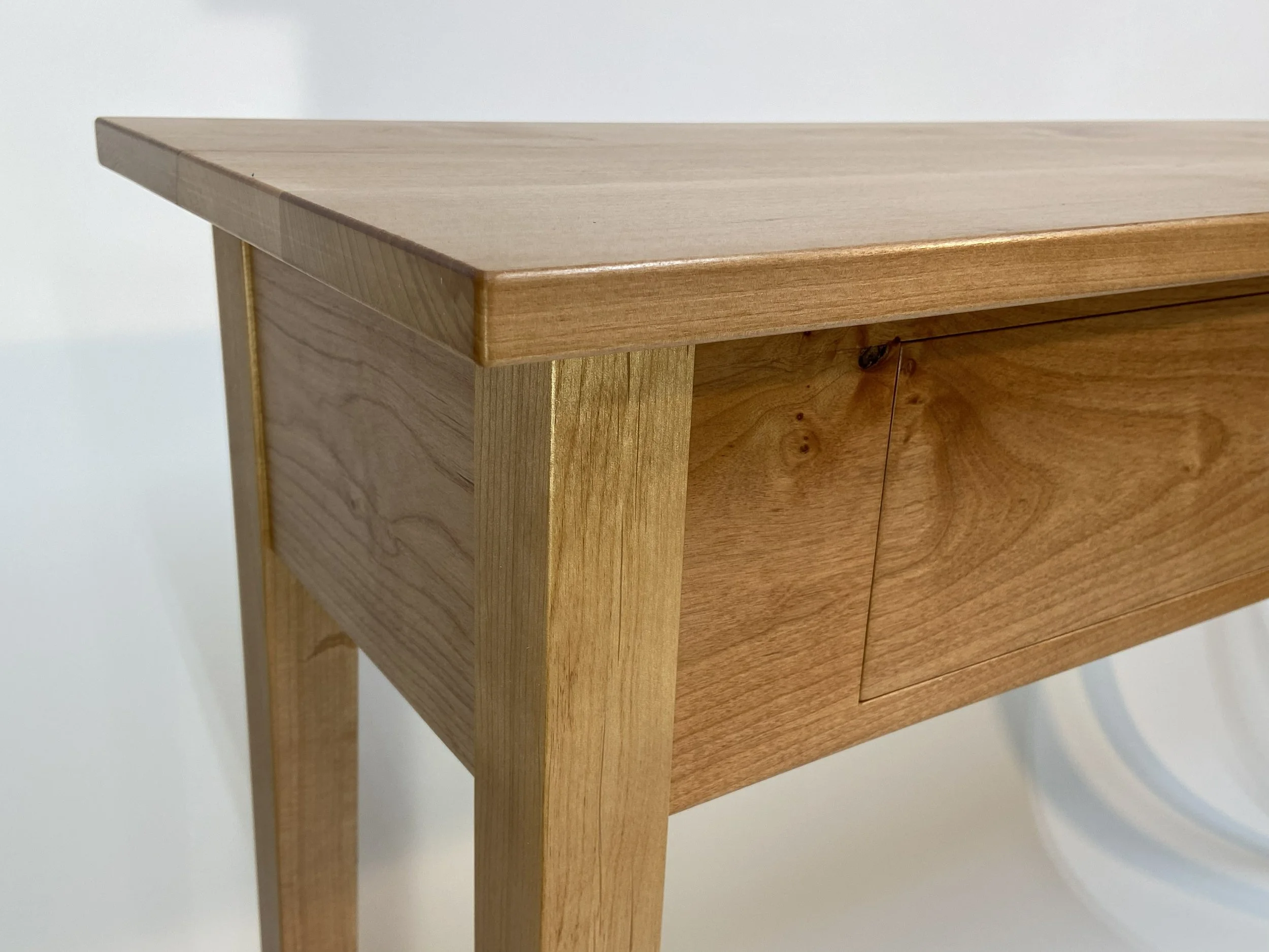 The top is 13/16" thick which adds visual weight to the table