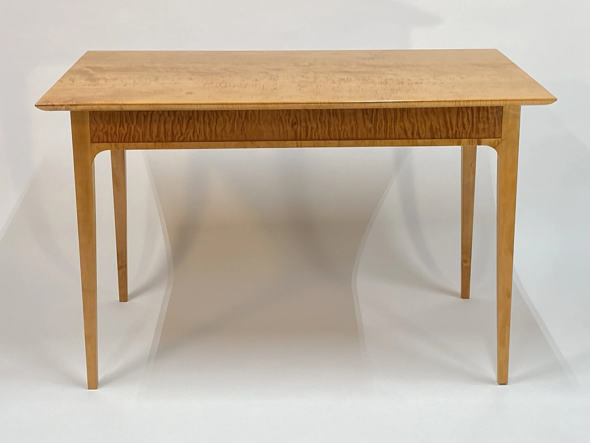 The under-table seating clearance is 25-1/8"