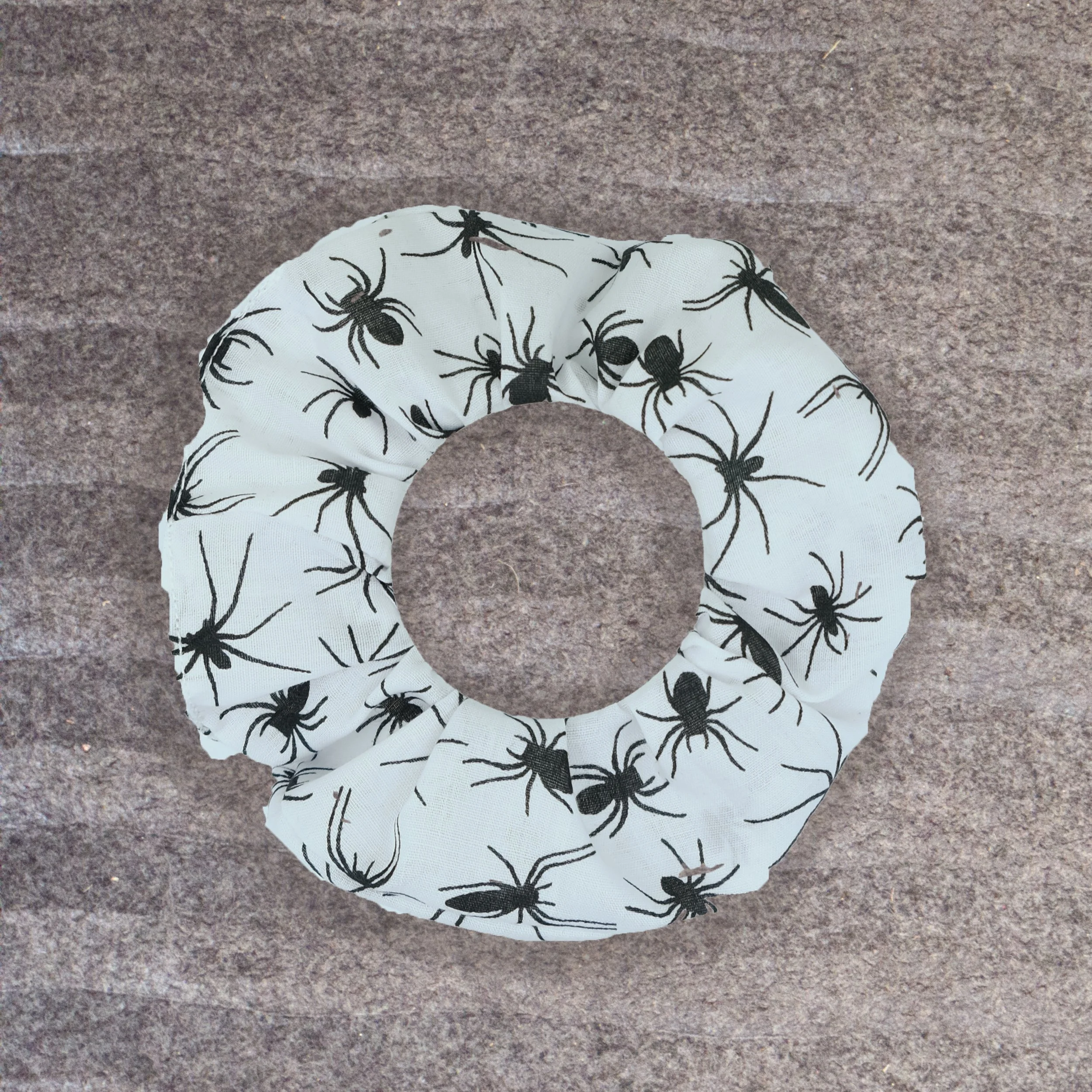 White Axis Range scrunchie with black spider pattern, handmade gothic hair accessory by Creatoria Nyx
