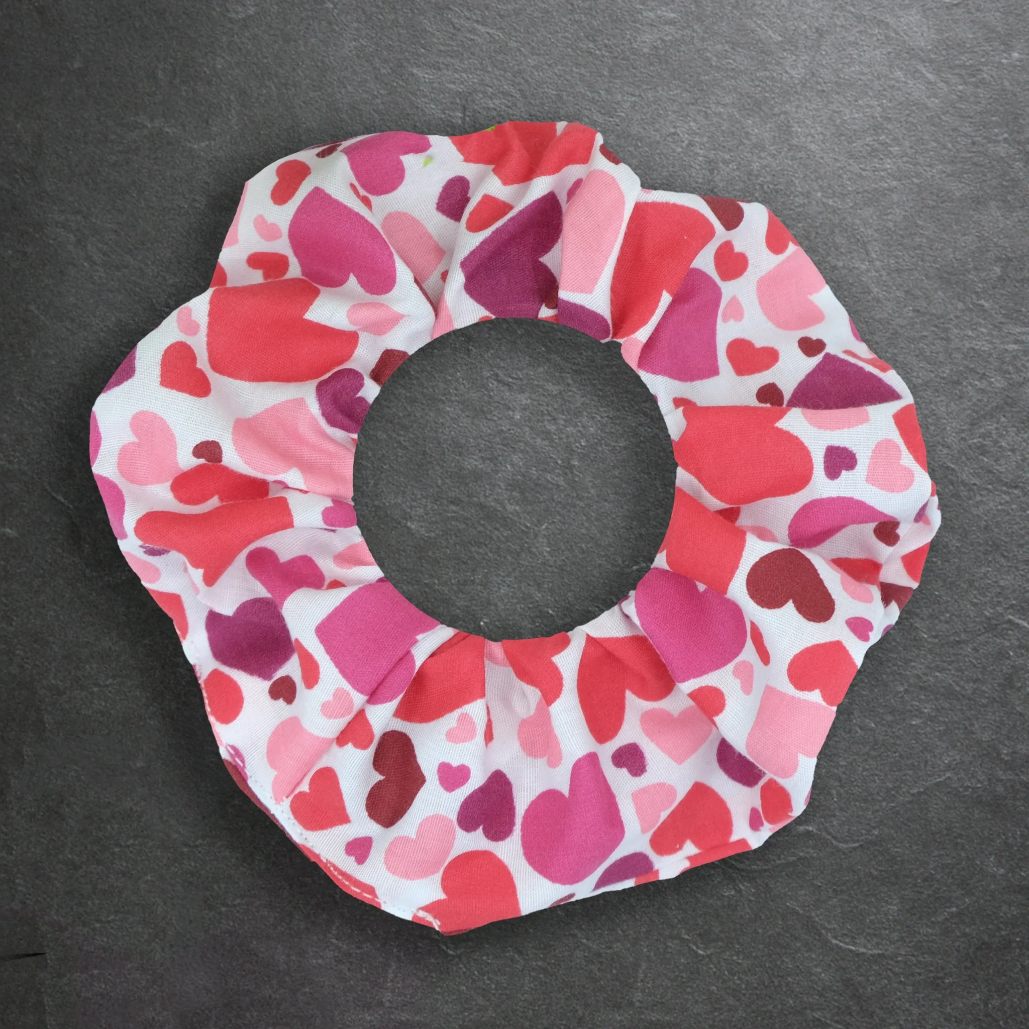 White Axis Range scrunchie with hearts in reds and pinks, handmade gothic hair accessory by Creatoria Nyx
