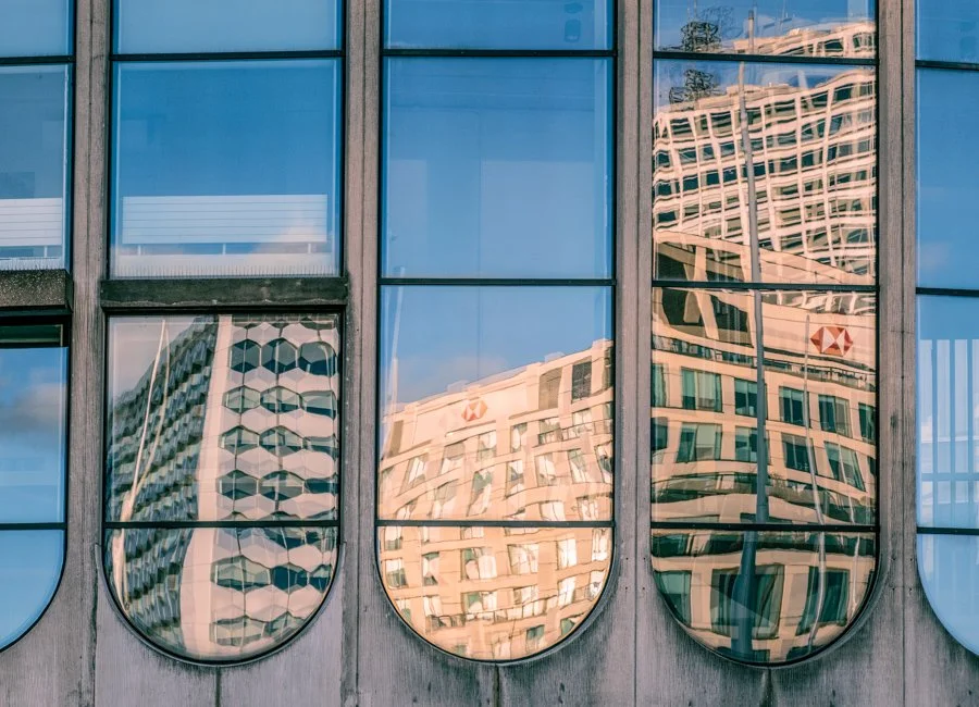 Warped Facades Photo Walks Photography by Catherine Knee. Distorted reflections of Birmingham buildings captured in curved glass creating abstract architectural patterns.