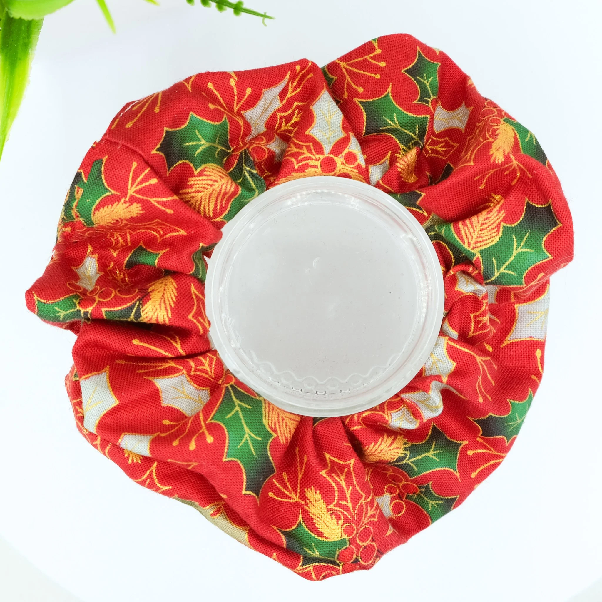 Red Christmas scrunchie with holly and gold accents, handmade festive hair accessory by Creatoria Nyx