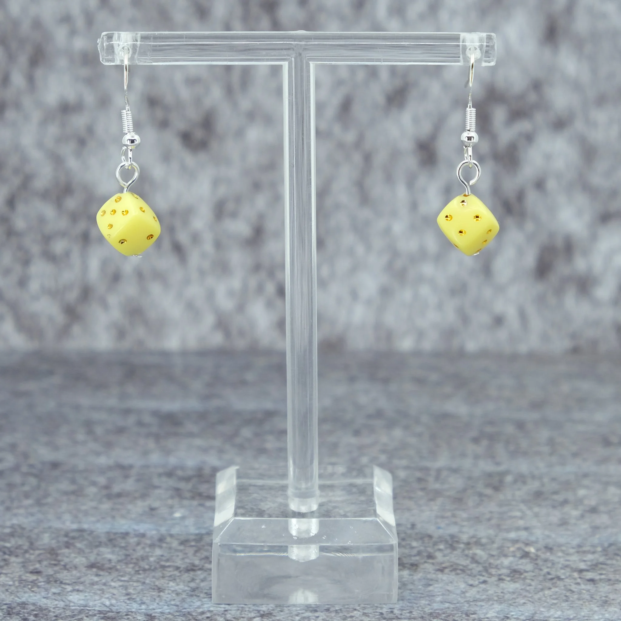 Opaque yellow Axis Range earrings with dice design and silver colour alloy hooks by Creatoria Nyx