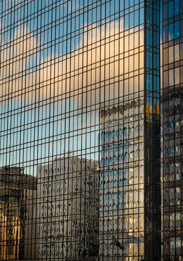 City of Glass Photo Walks Photography by Catherine Knee. Modern Birmingham office buildings reflected in glass architecture beneath a dramatic evening sky.