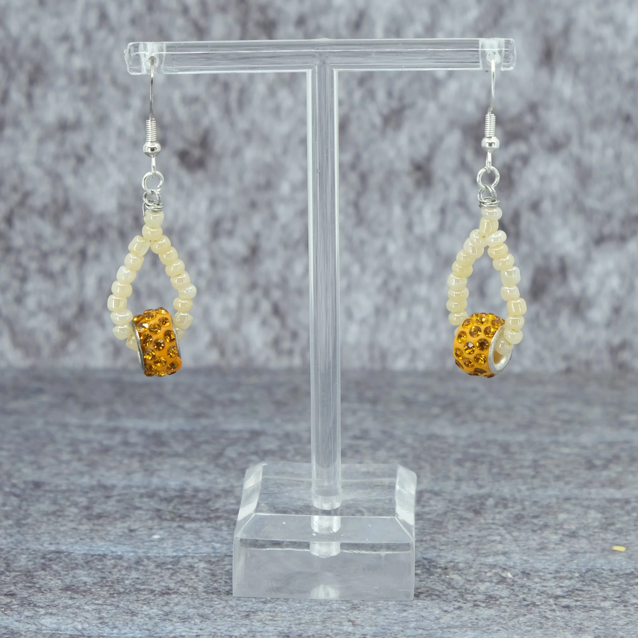 Yellow Nyx Picks Range earrings with beaded loop design and silver colour fittings by Creatoria Nyx