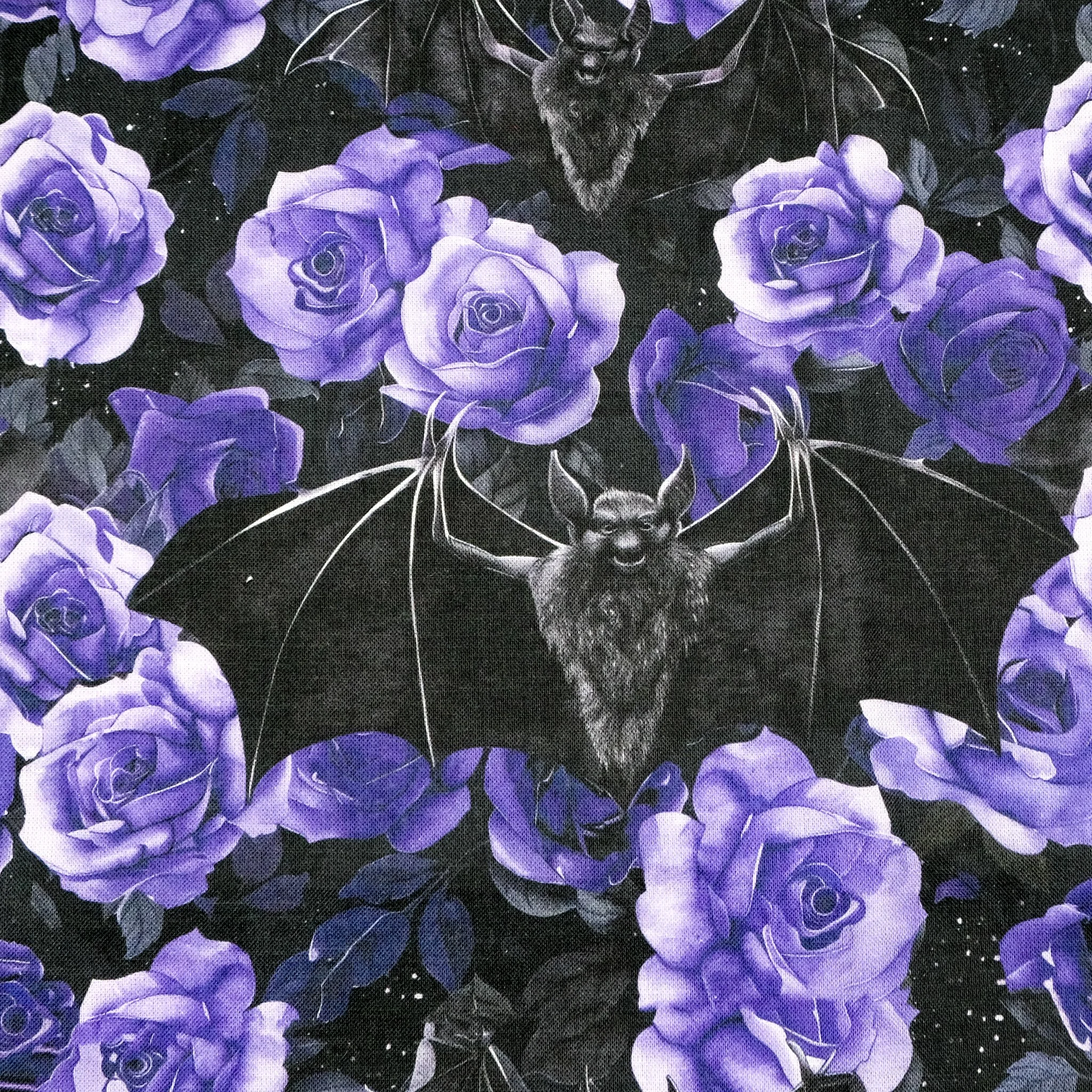 Fabric close up showing bats and purple roses on charcoal grey background, used for handmade Signature Range scrunchie by Creatoria Nyx