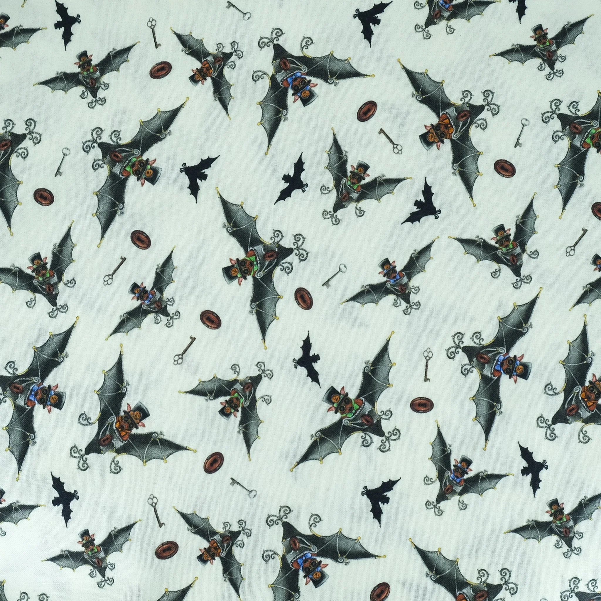 Fabric close up showing steampunk bats on cream background, used for handmade Axis Range scrunchie by Creatoria Nyx