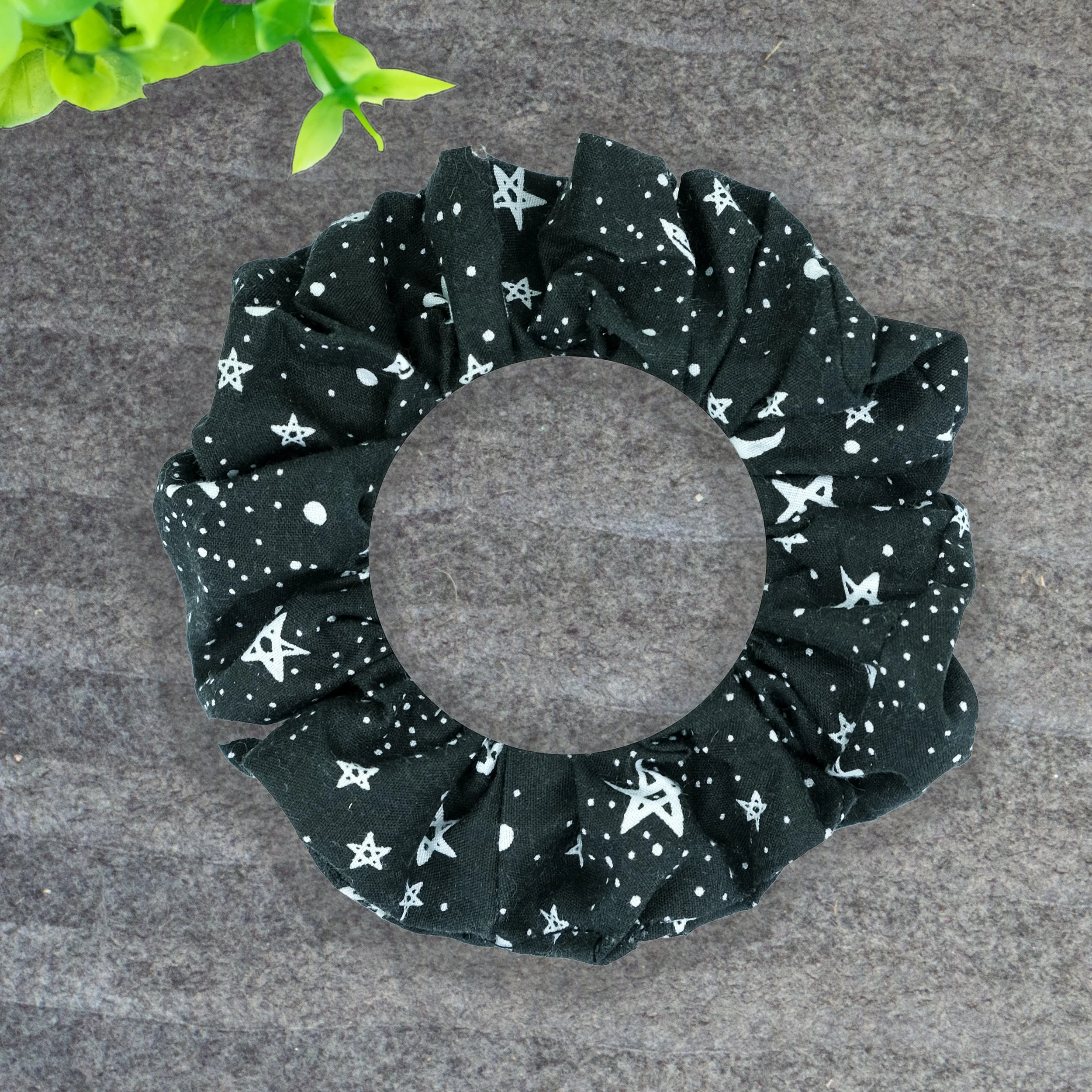 Black Axis Range scrunchie with white stars and moons pattern, handmade gothic hair accessory by Creatoria Nyx