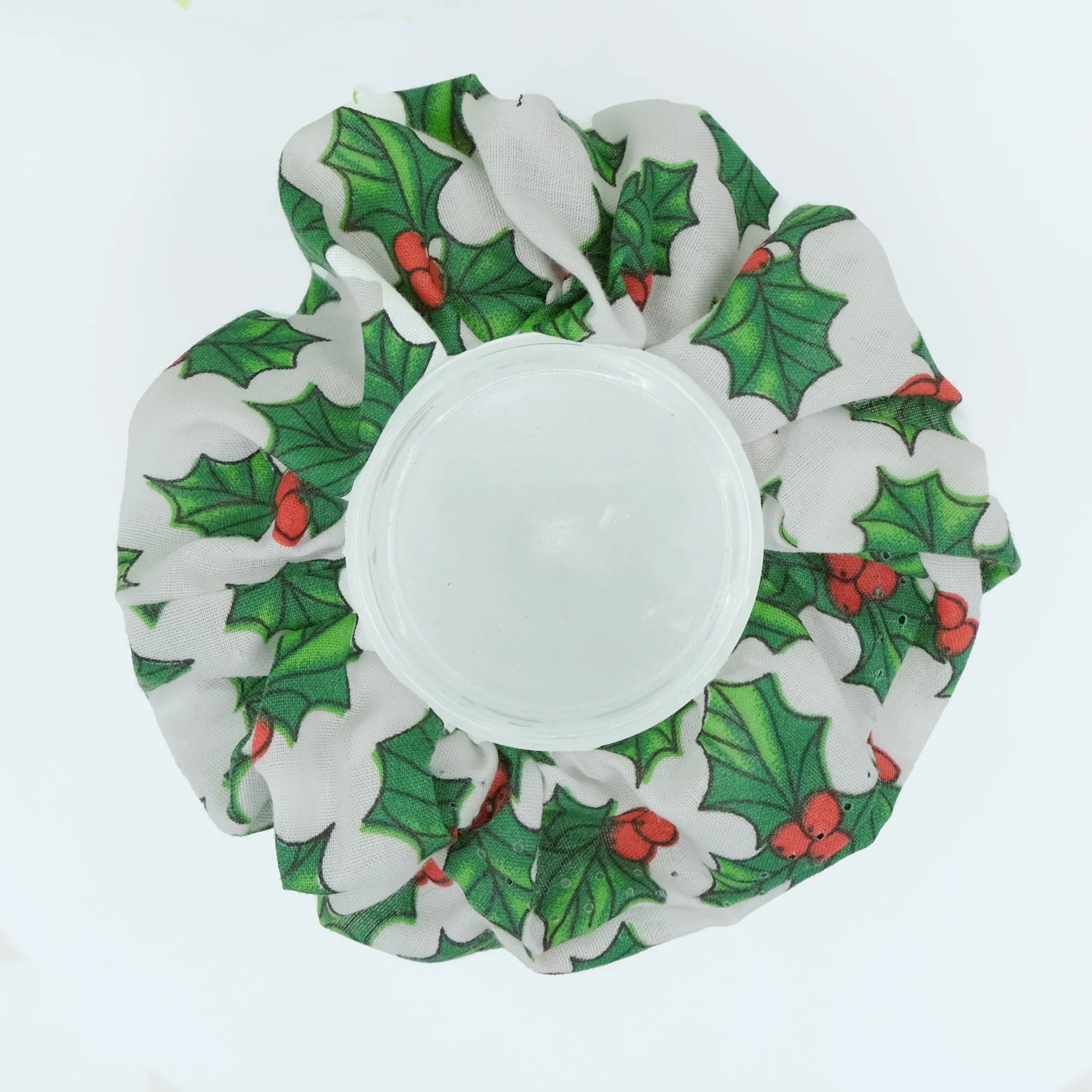 White Christmas scrunchie with green holly design, handmade festive hair accessory by Creatoria Nyx
