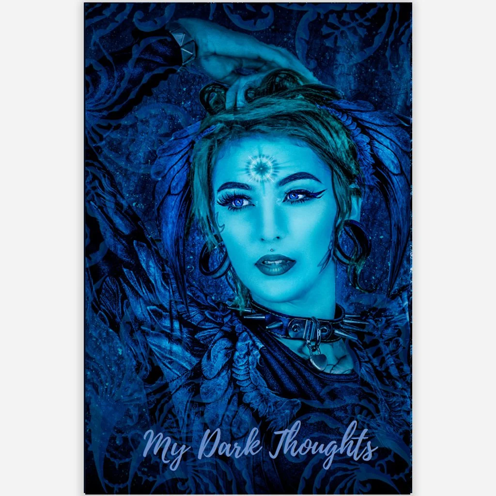 Square thumbnail of notebook front cover with striking blue portrait of a woman with glowing forehead symbol, dark collar, and dramatic styling, titled My Dark Thoughts