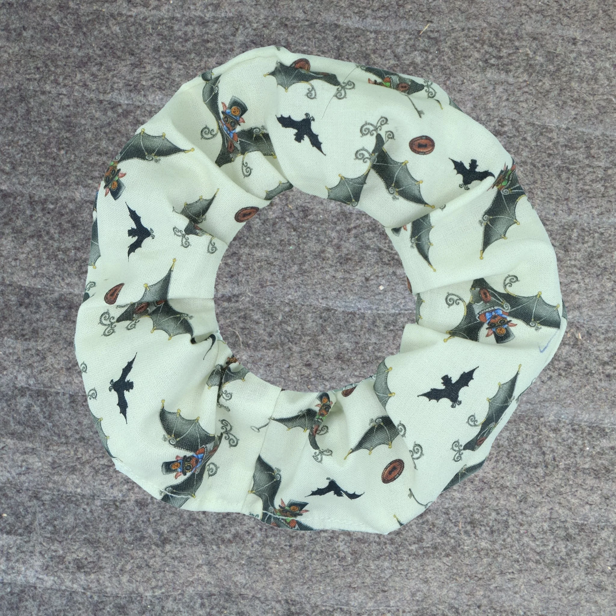 Cream Axis Range scrunchie with steampunk bat pattern, handmade alternative hair accessory by Creatoria Nyx