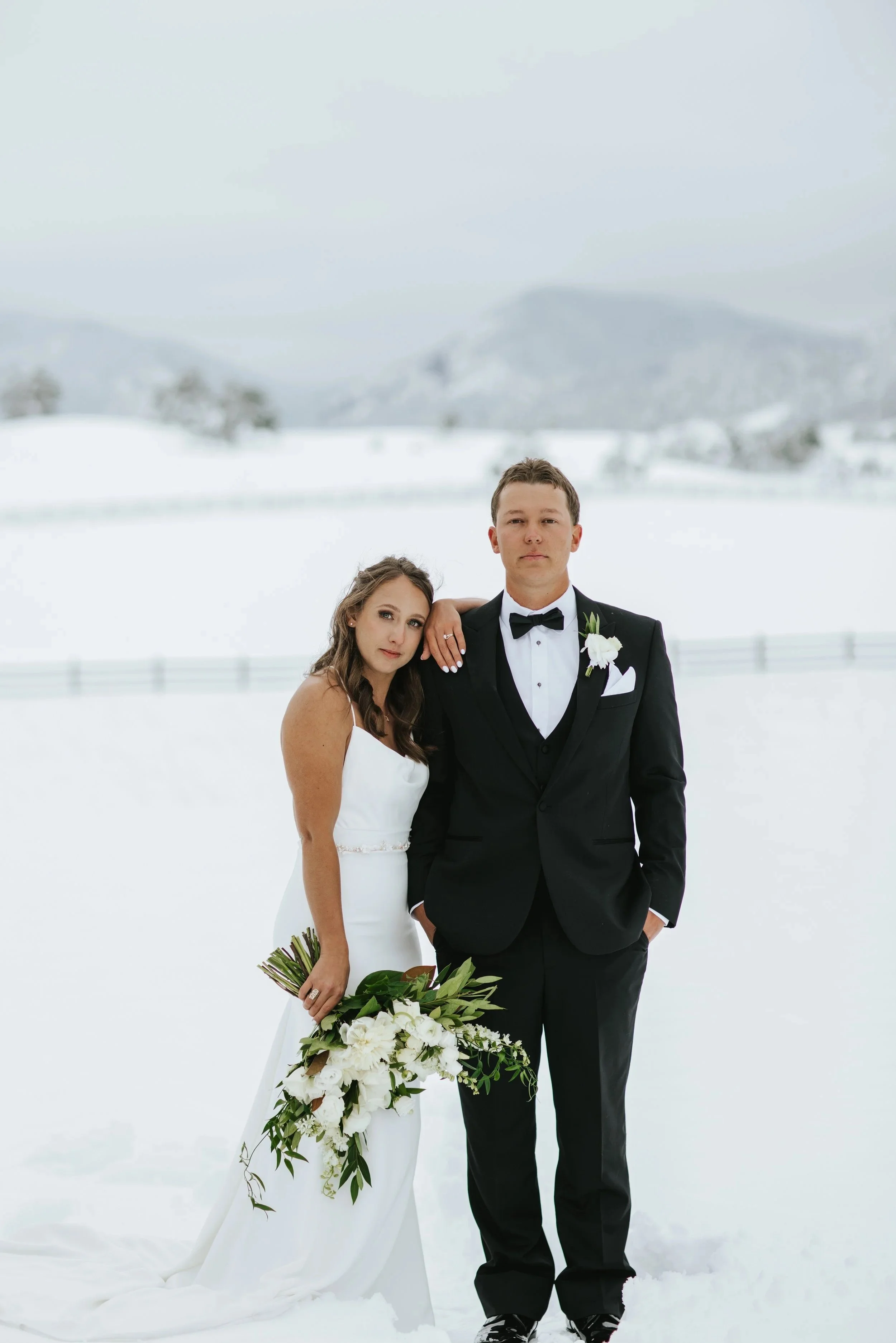 Caitlin & Chris | White Winter Colorado Wedding at Spruce Mountain Ranch in Larkspur, Colorado