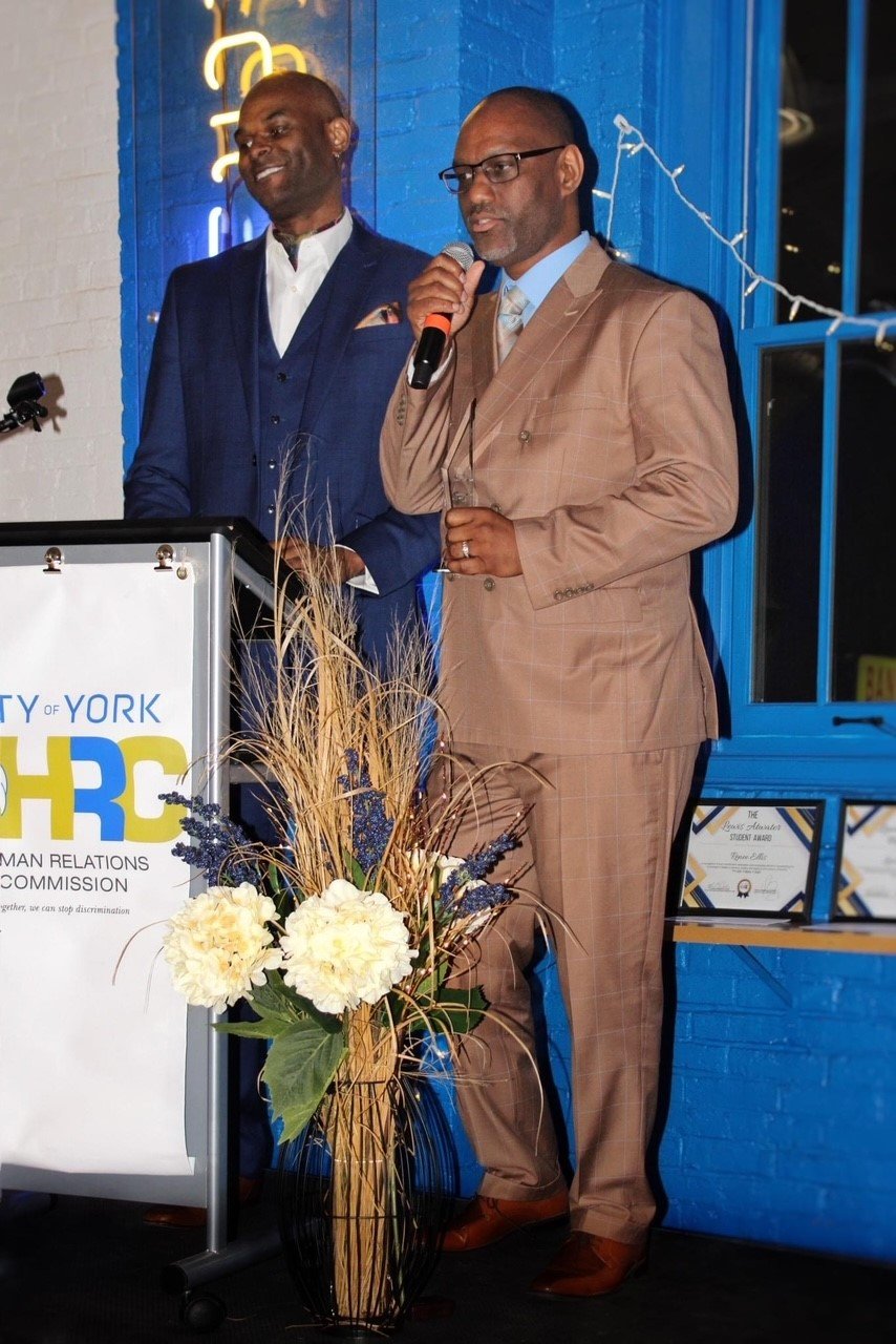 Four Squares York accepting award from HRC of York City.