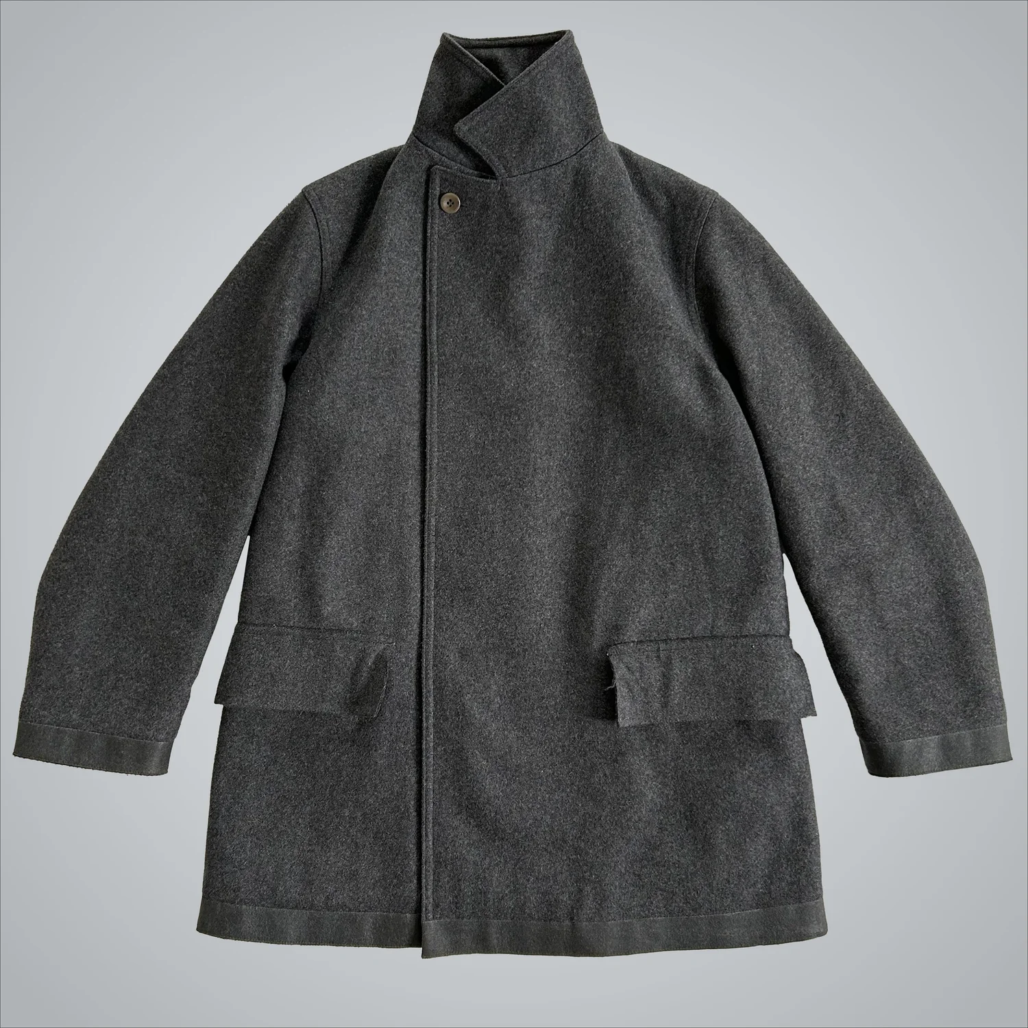 Mandarina Duck wool coat with rubberized hems (1990s) — Guerrero