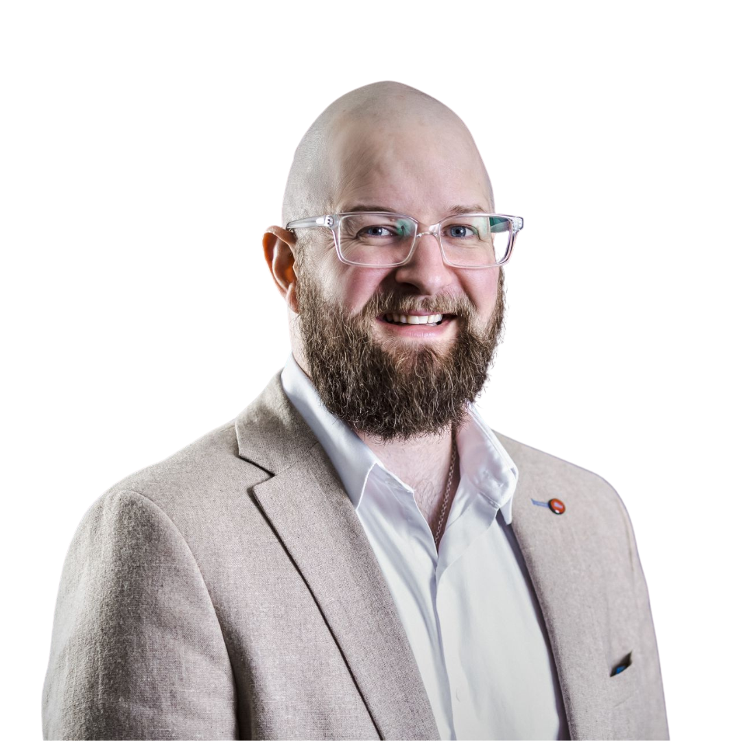 Headshot of Thomas Jackson, a white male with glasses and a beard