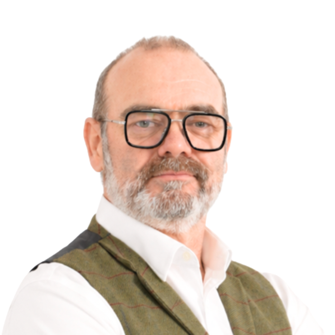 Headshot of Mark Rigby, a white male with a greying beard and black rimmed glasses