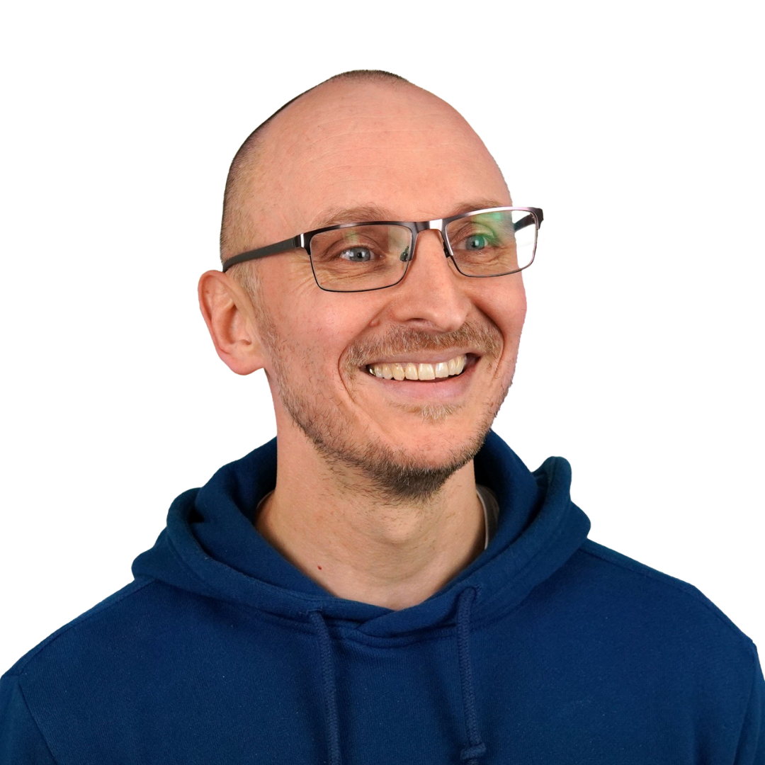 Headshot of Lee Chambers, a white male wearing glasses and a navy blue hoodie