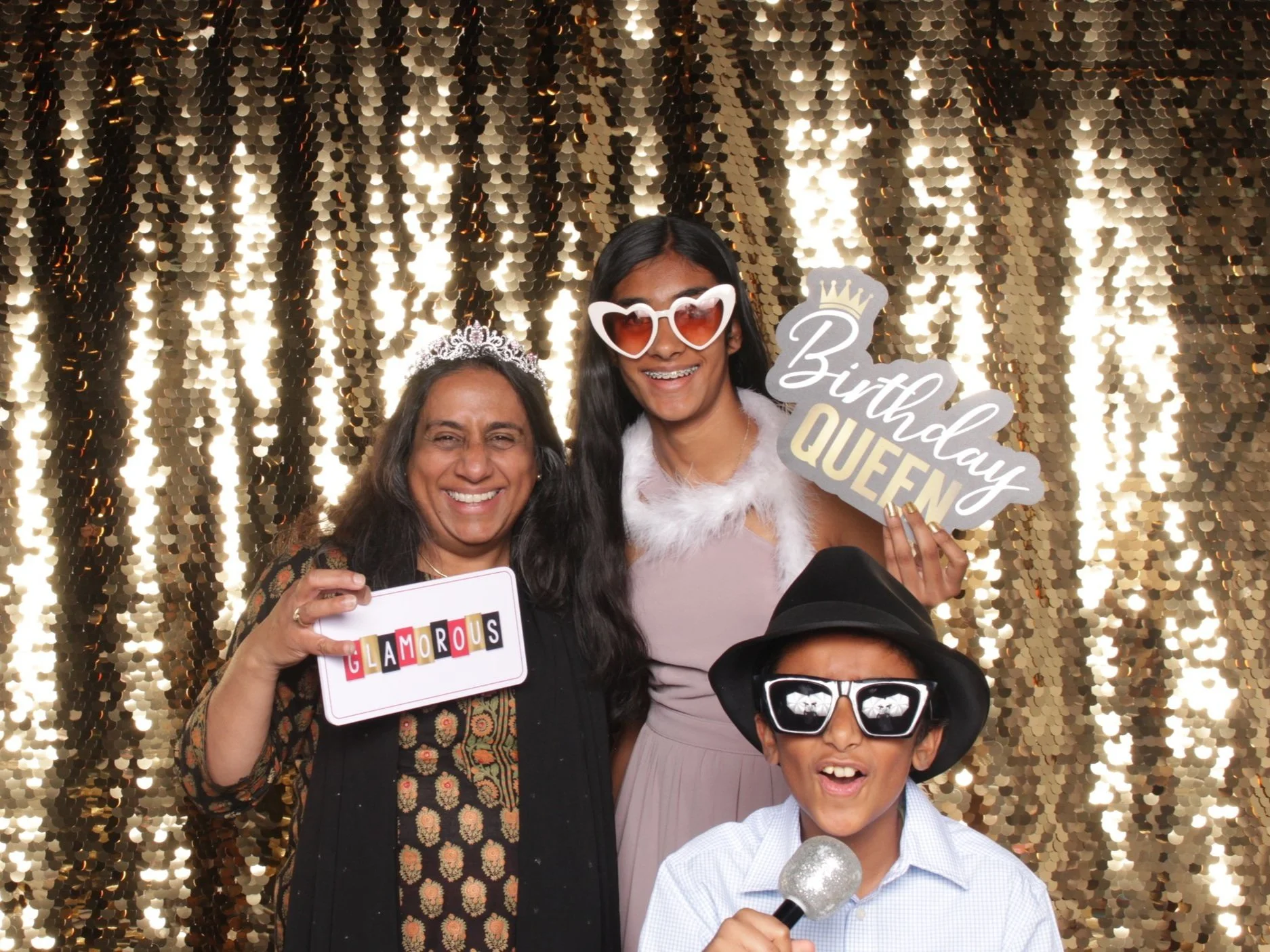Milestones and Birthdays with gold sequin backdrop in Central Virginia with mother, son and daughter posing with Oh Snap Memories Photo Booth in Richmond, Virginia.