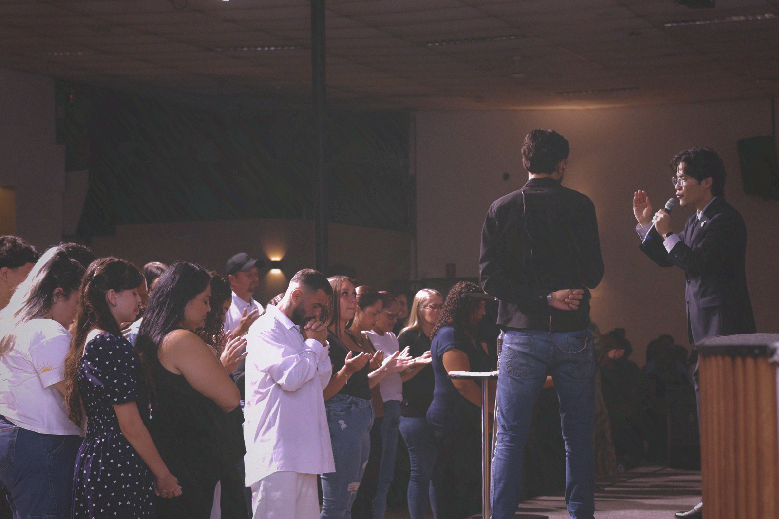 Pastor John Cho evangelizing to a crowd